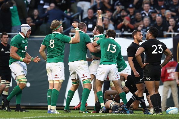 Ireland players celebrate during their win over the All Blacks at Soldier Field in Chicago in...
