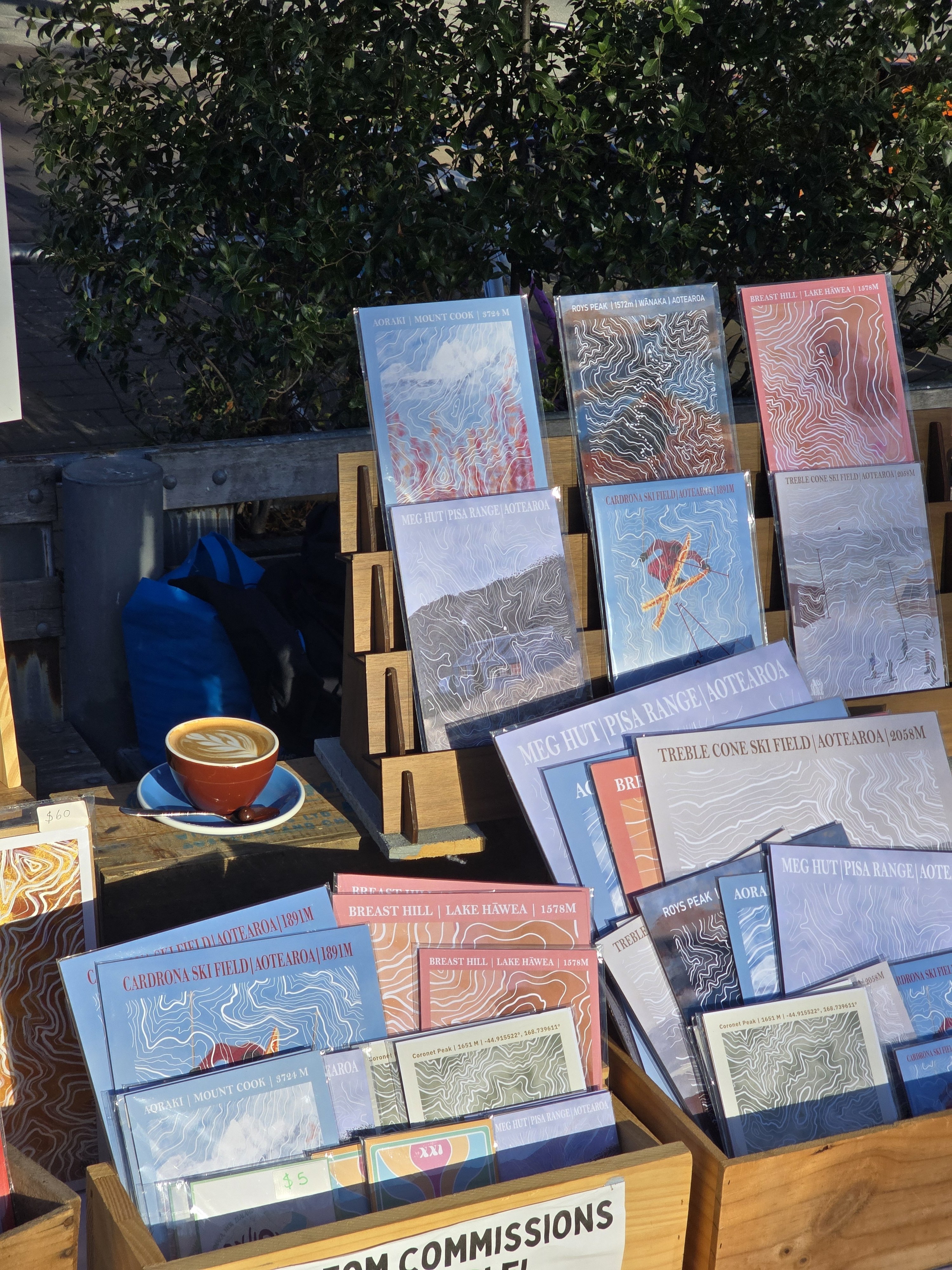 Alli Marie's growing market table of artwork inspired by topographic maps of natural landscapes...