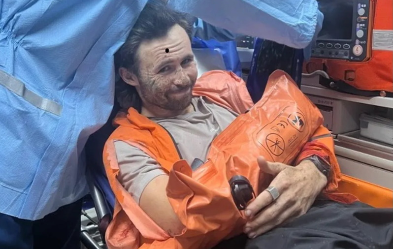 Billy Halloran on his way to hospital after the bear attack, along with an x-ray of his broken...