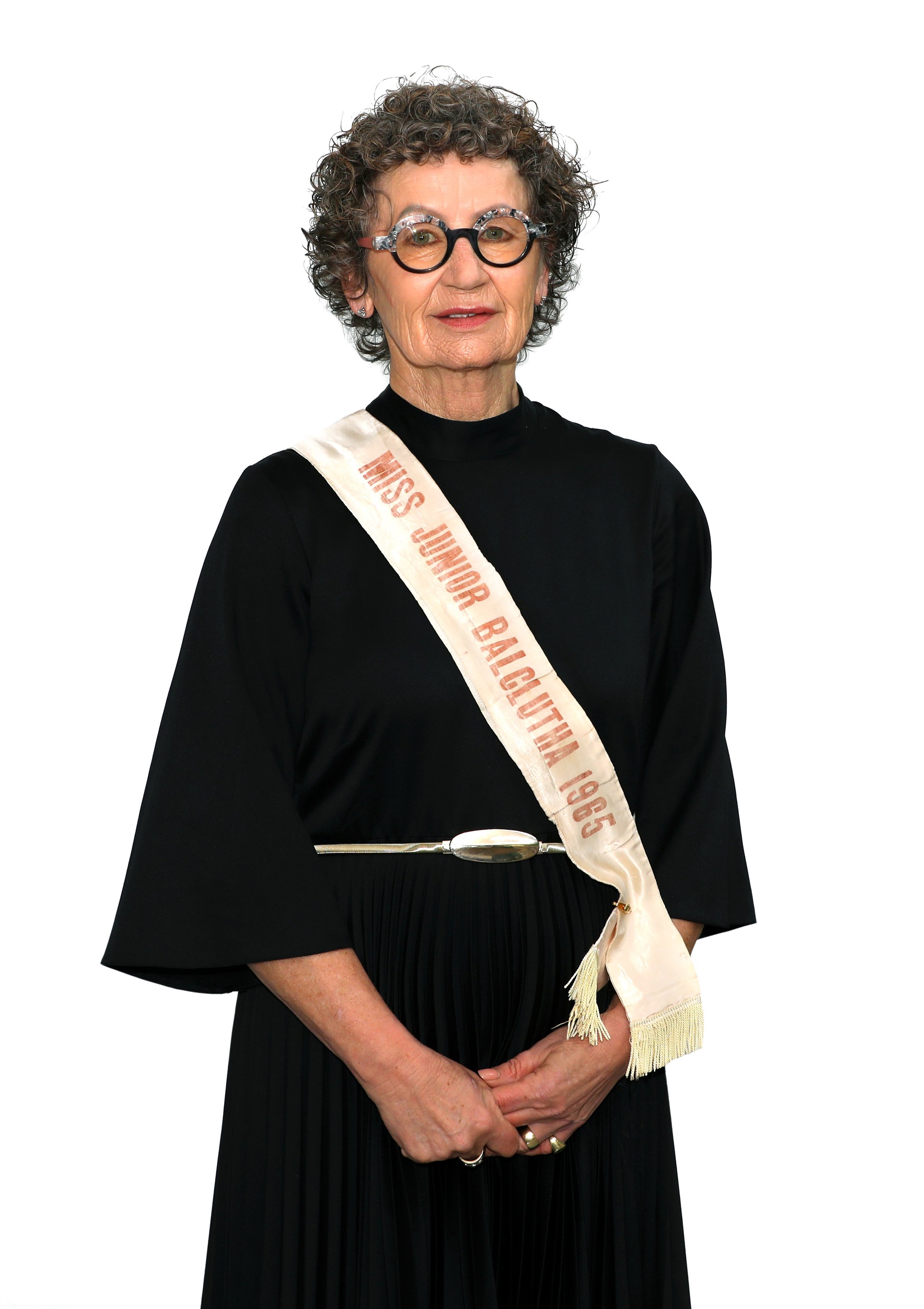 The present day Debbie Webster (nee Hurring) dons her Miss Junior Balclutha winner’s sash once...