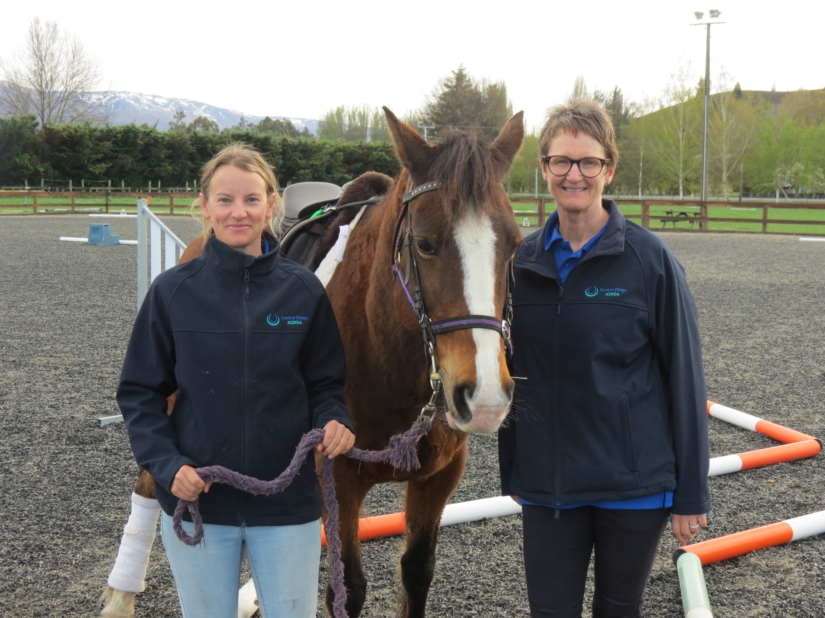 Central Otago Riding for the Disabled president and head coach Lynda Gray (right) with group co...