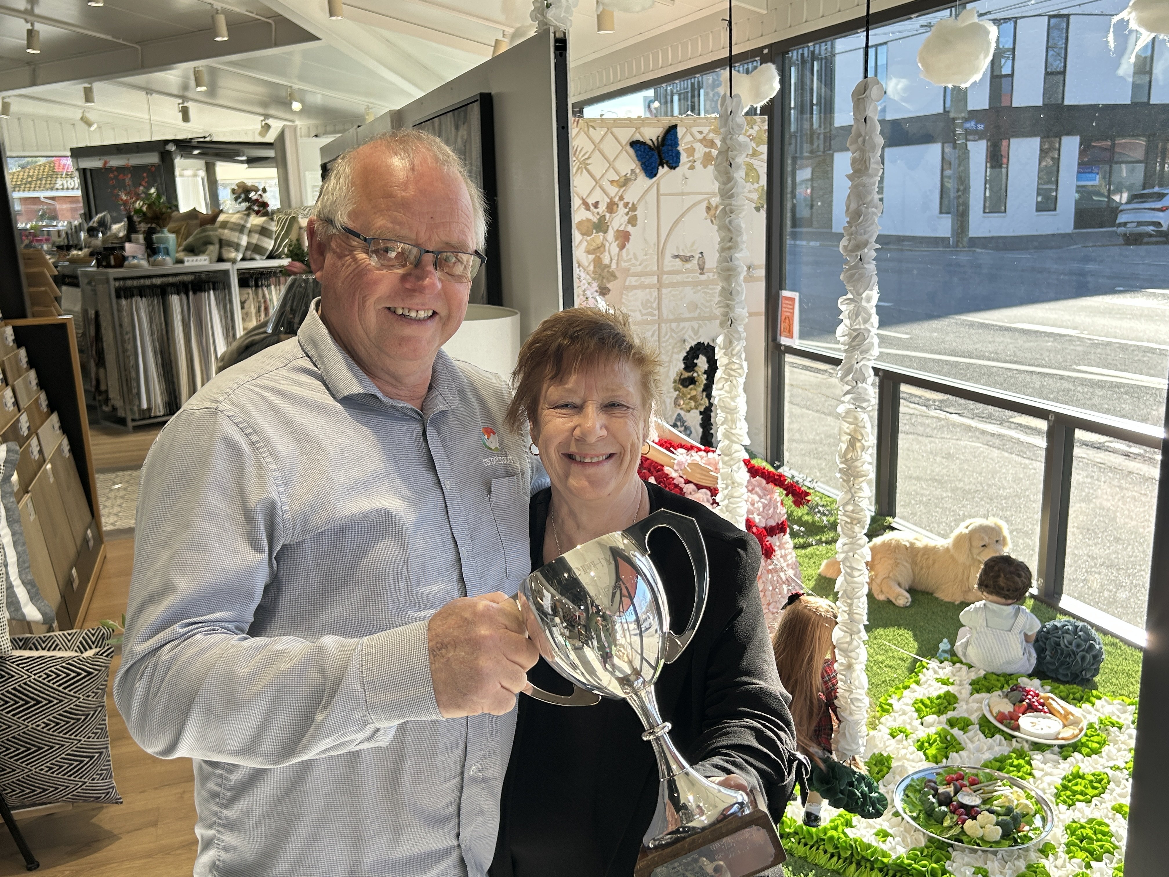 Central Interiors owners Grant and Dawn Sutherland are thrilled with the Bain Cup they were...