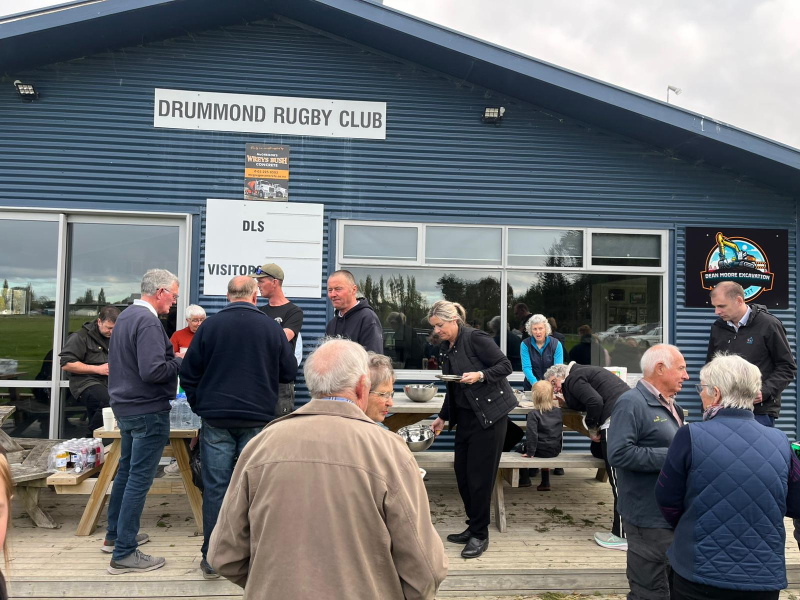 People attend a community barbeque in Drummond. Photo: Supplied / Emergency Management