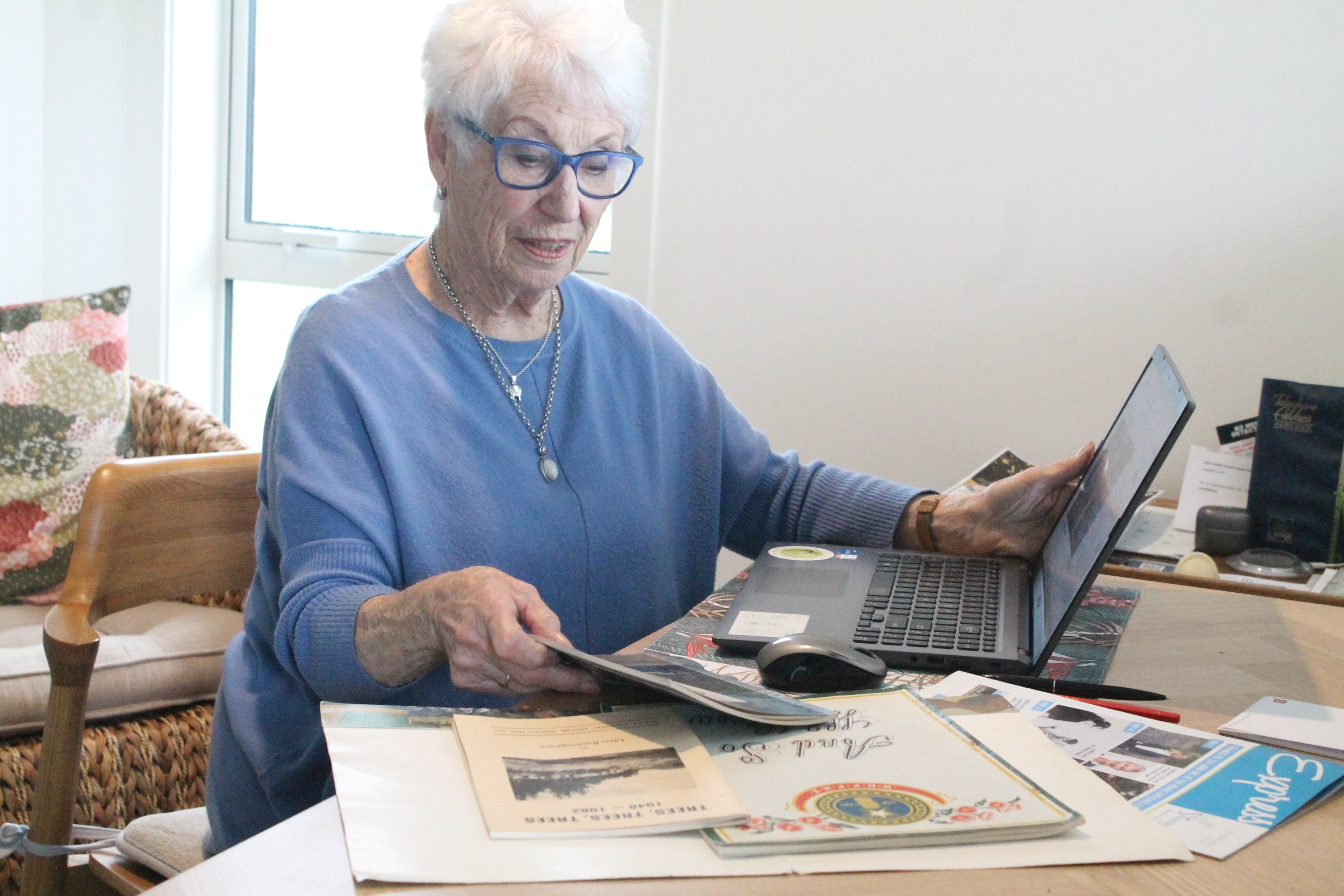 Jeanette McIntyre looks through her collection of Rural Women NZ items at her home in Gore. PHOTO...