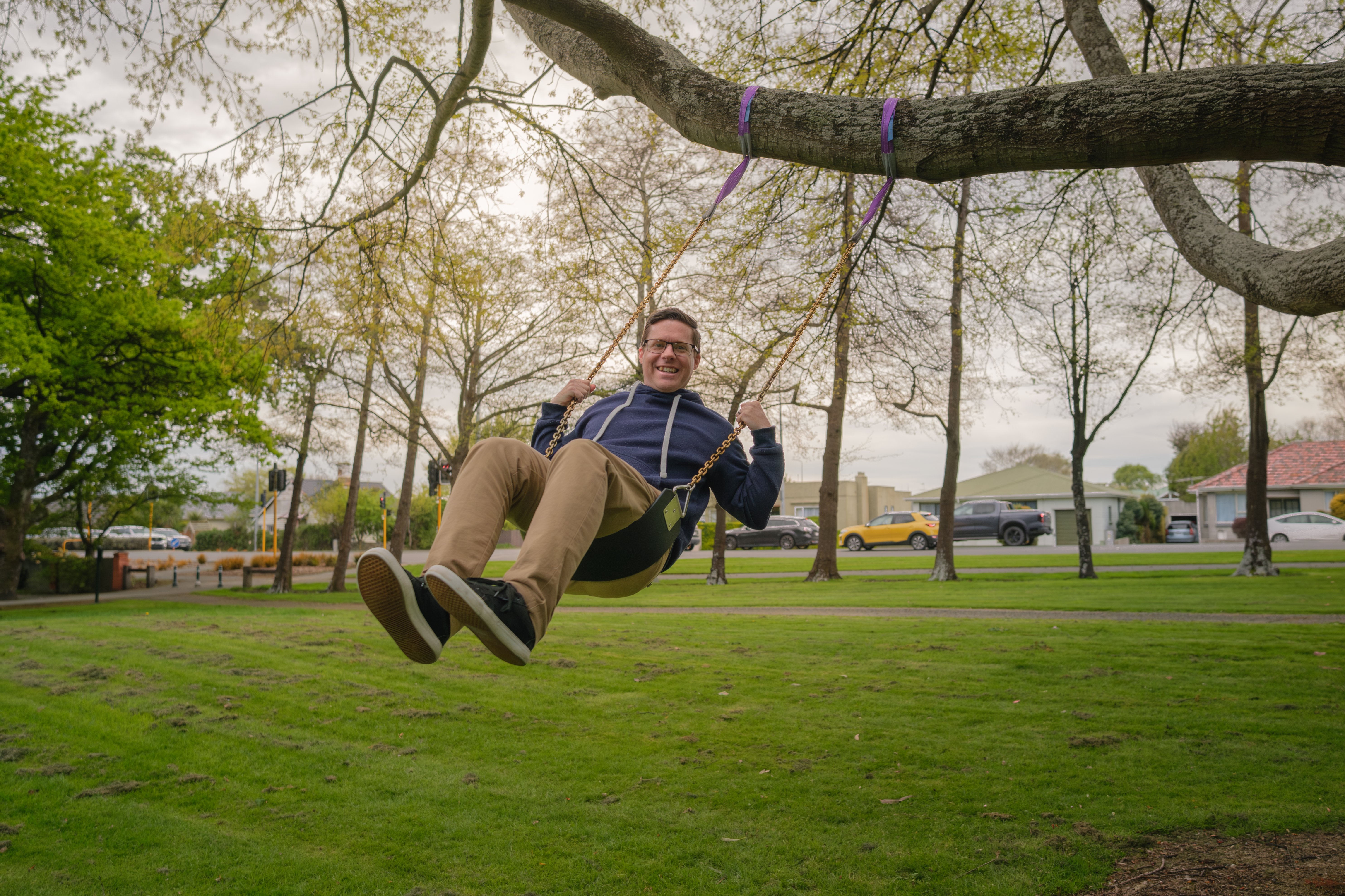 Invercargill City Council play advocate Dr Damien Puddle tries out one of the new swings...