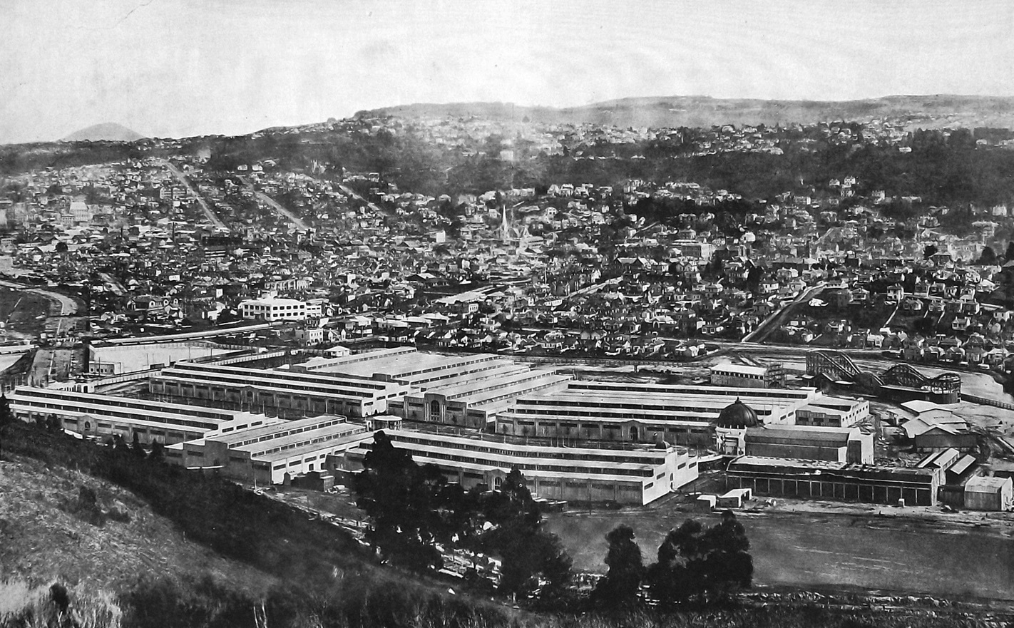 The New Zealand and South Seas Exhibition buildings at Logan Park, two months before opening on...