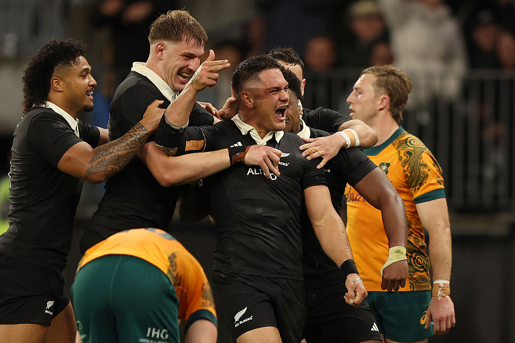 All Blacks centre Quinn Tupaea celebrates scoring a try against the Wallabies at Optus Stadium in...