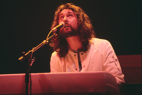 English musician and keyboard player Rick Davies performs live on stage with Supertramp on tour...