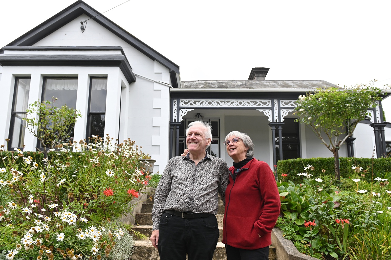 Well-known Dunedin couple Brian Cox and Mary Jane Sneyd have farewelled their brick villa, built...