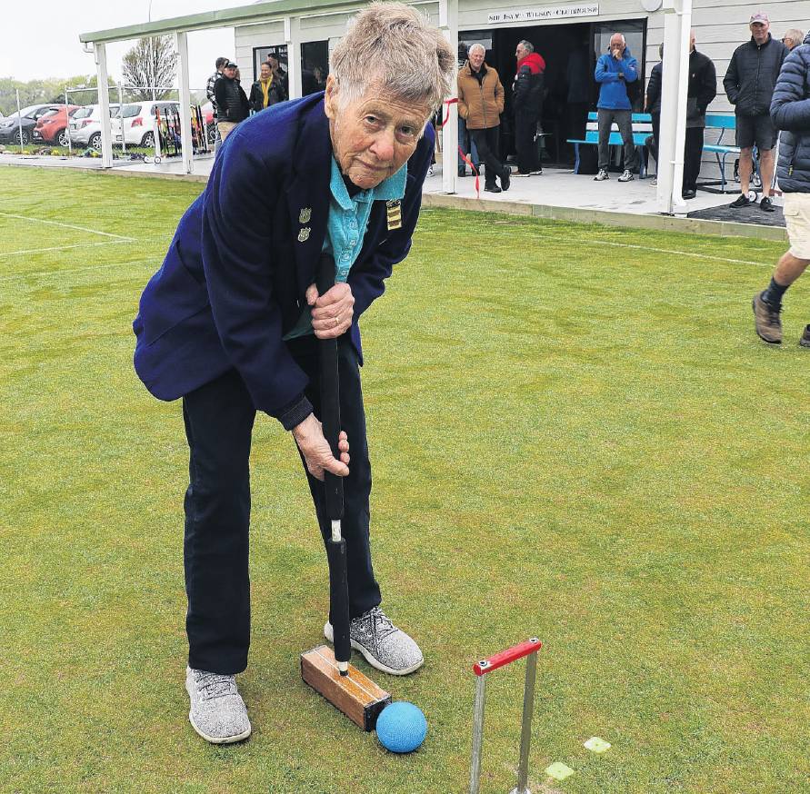 Kaiapoi Croquet Club member Adrienne Lamb plays the Run the Hoop to mark the first game at the...