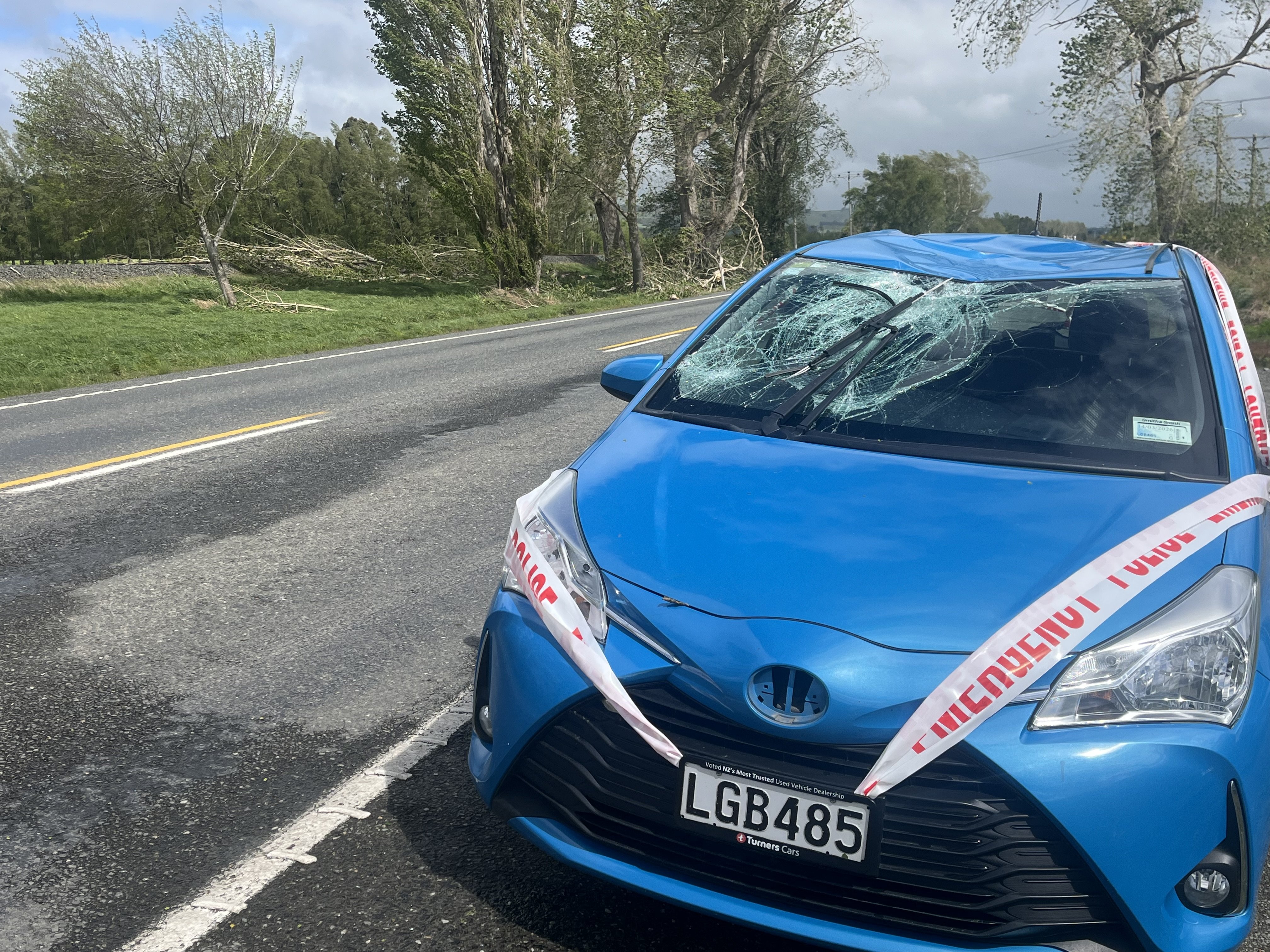 A car’s roof was smashed when a tree fell on it on State Highway 1 between Gore and Mataura....