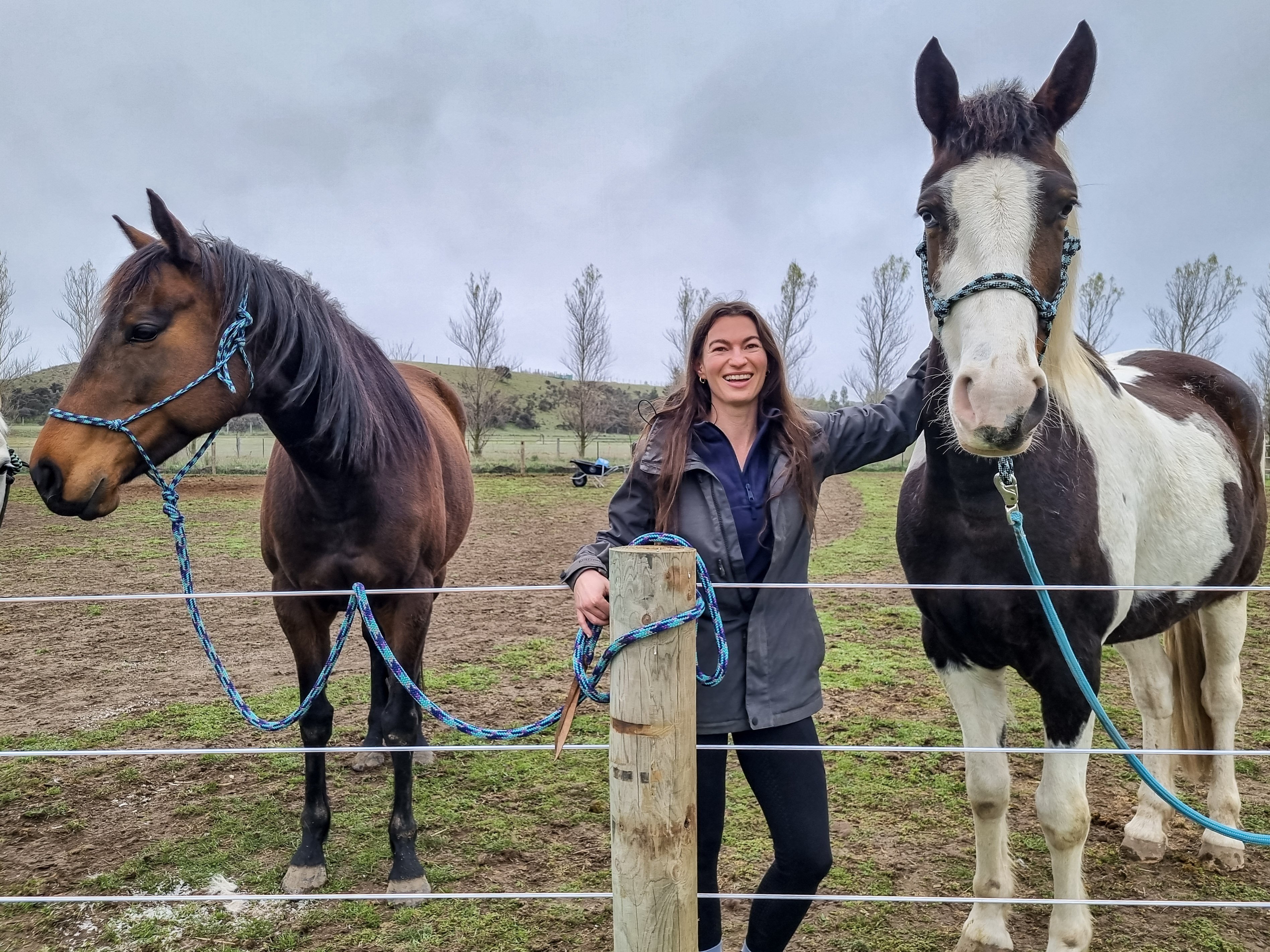 Therapist Kiara Moore and her horse helpers on her Queensbury paddock. PHOTO: OLIVIA CALDWELL