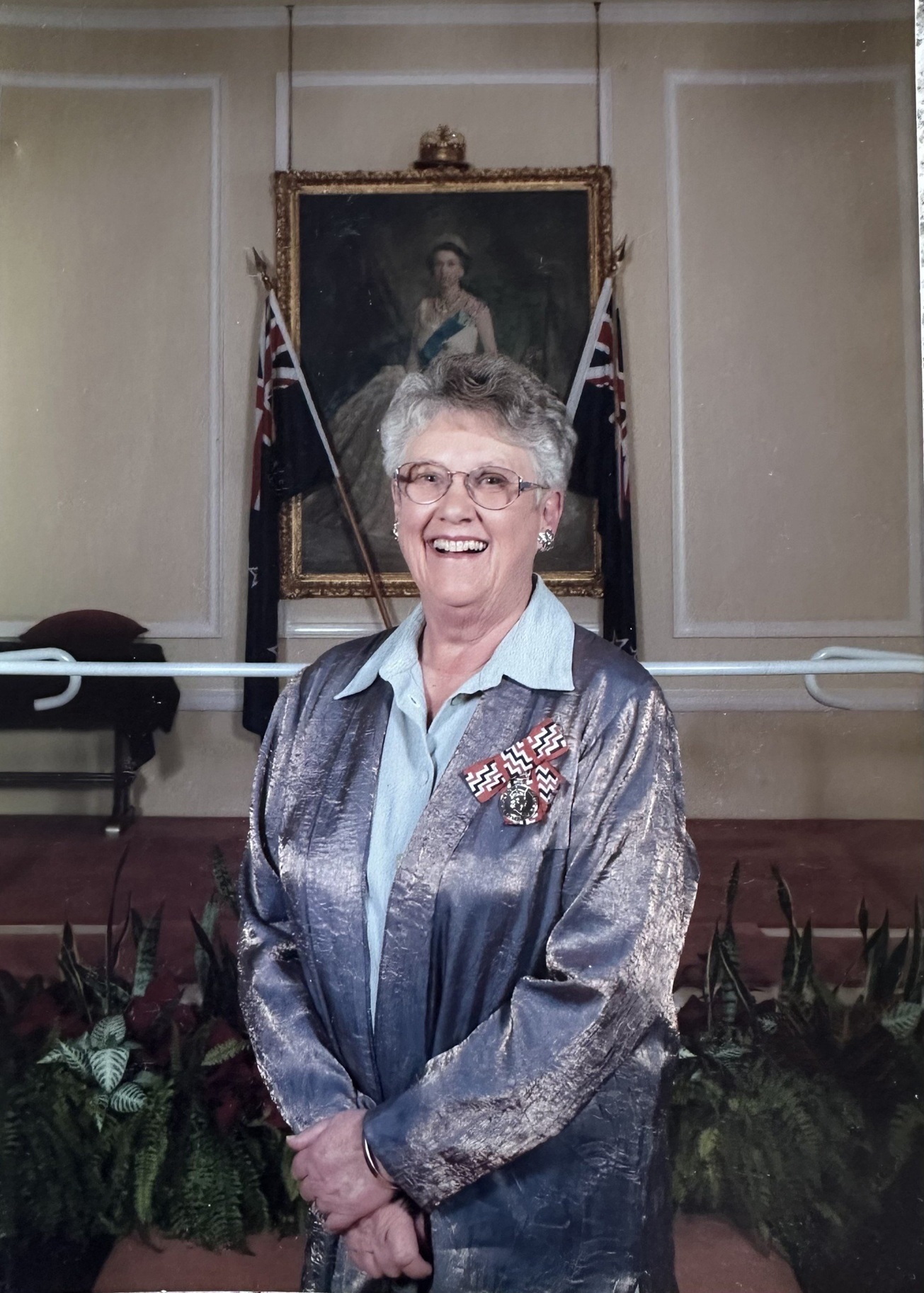Liz Duggan receives her QSM in 2004. Photo: supplied