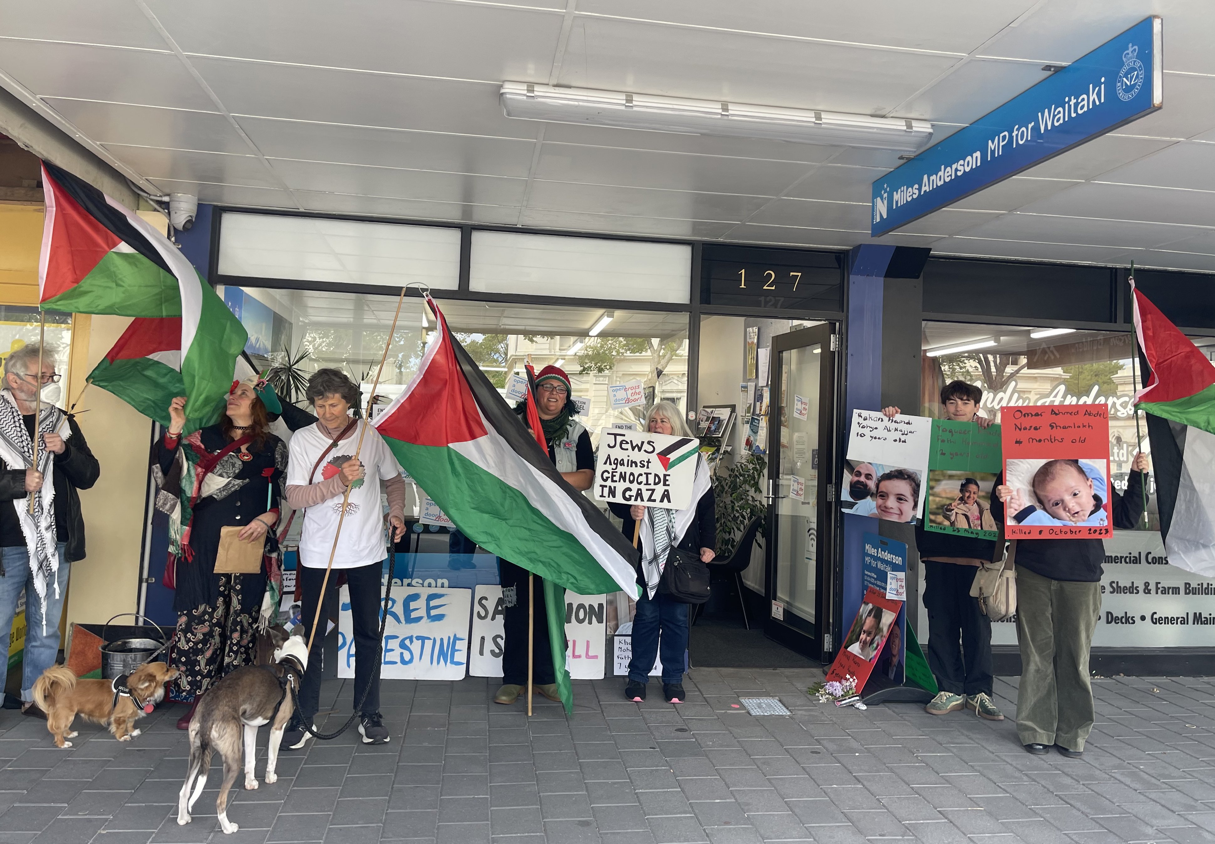 Pro-Palestine protesters gather outside Waitaki MP Miles Anderson’s Oamaru office yesterday,...
