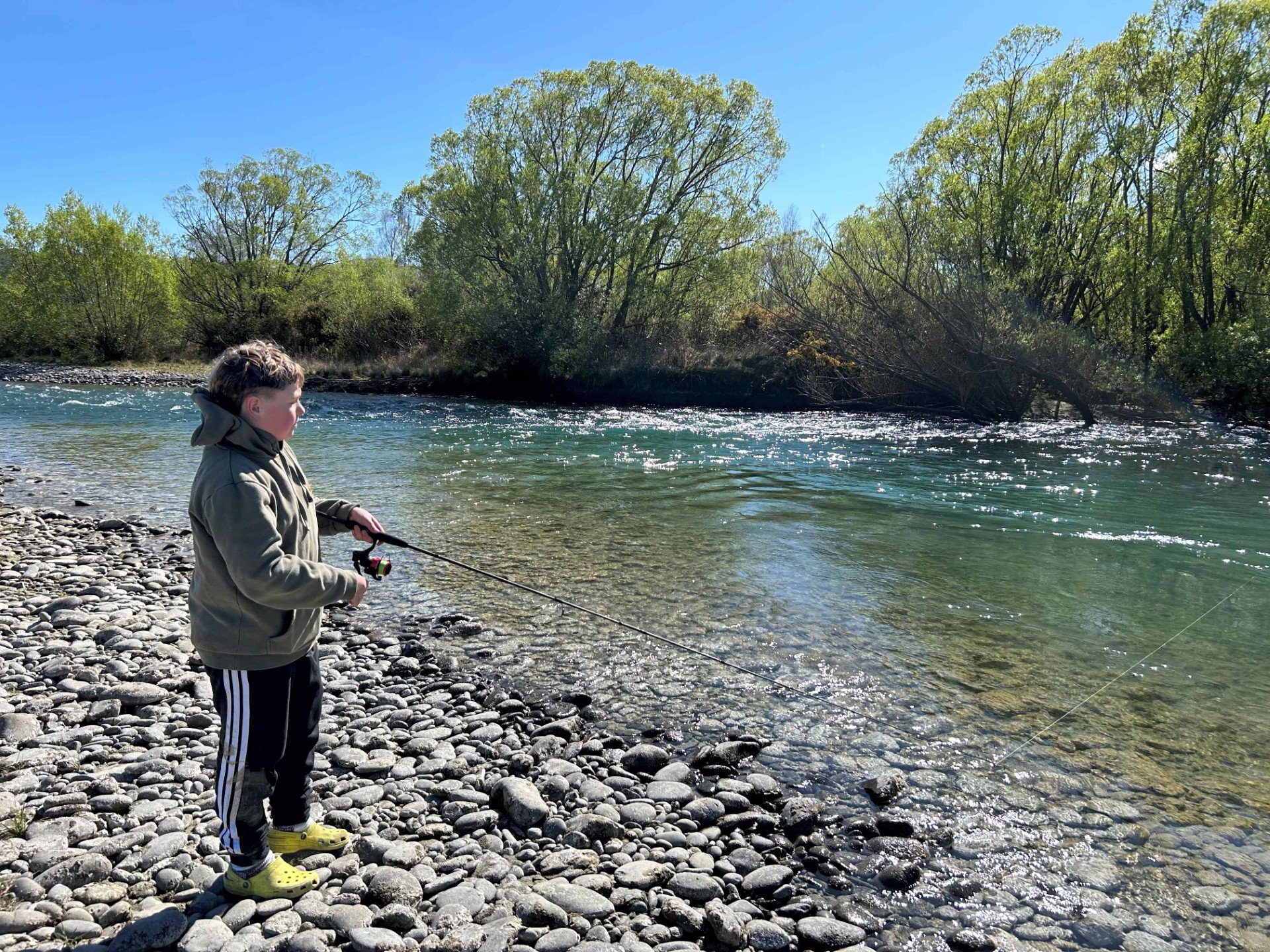 Jackson Collins, 15, of Oamaru, fishes the Waitaki River near Kurow. PHOTO: BLAKE HARPER/FISH &...