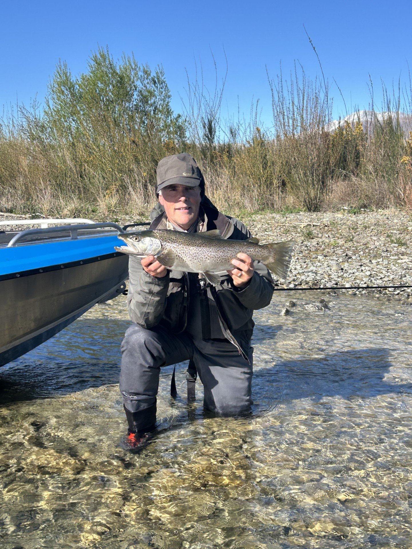 Stephen Brailsford, of Christchurch, displays a 1.4kg brown trout he caught in the Waitaki River....