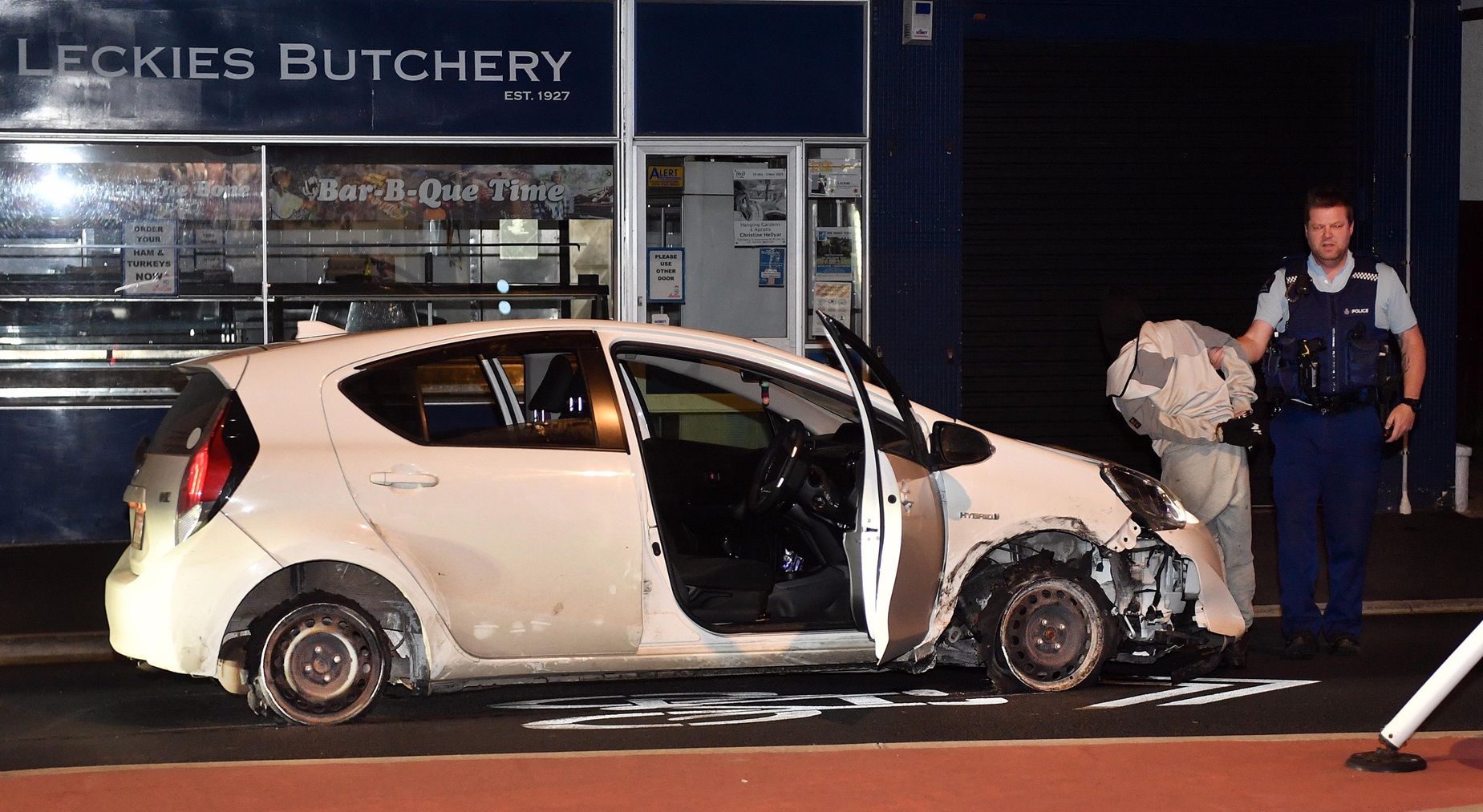 An abandoned car sits in Forbury Rd after being driven through the city on sparking rims after...