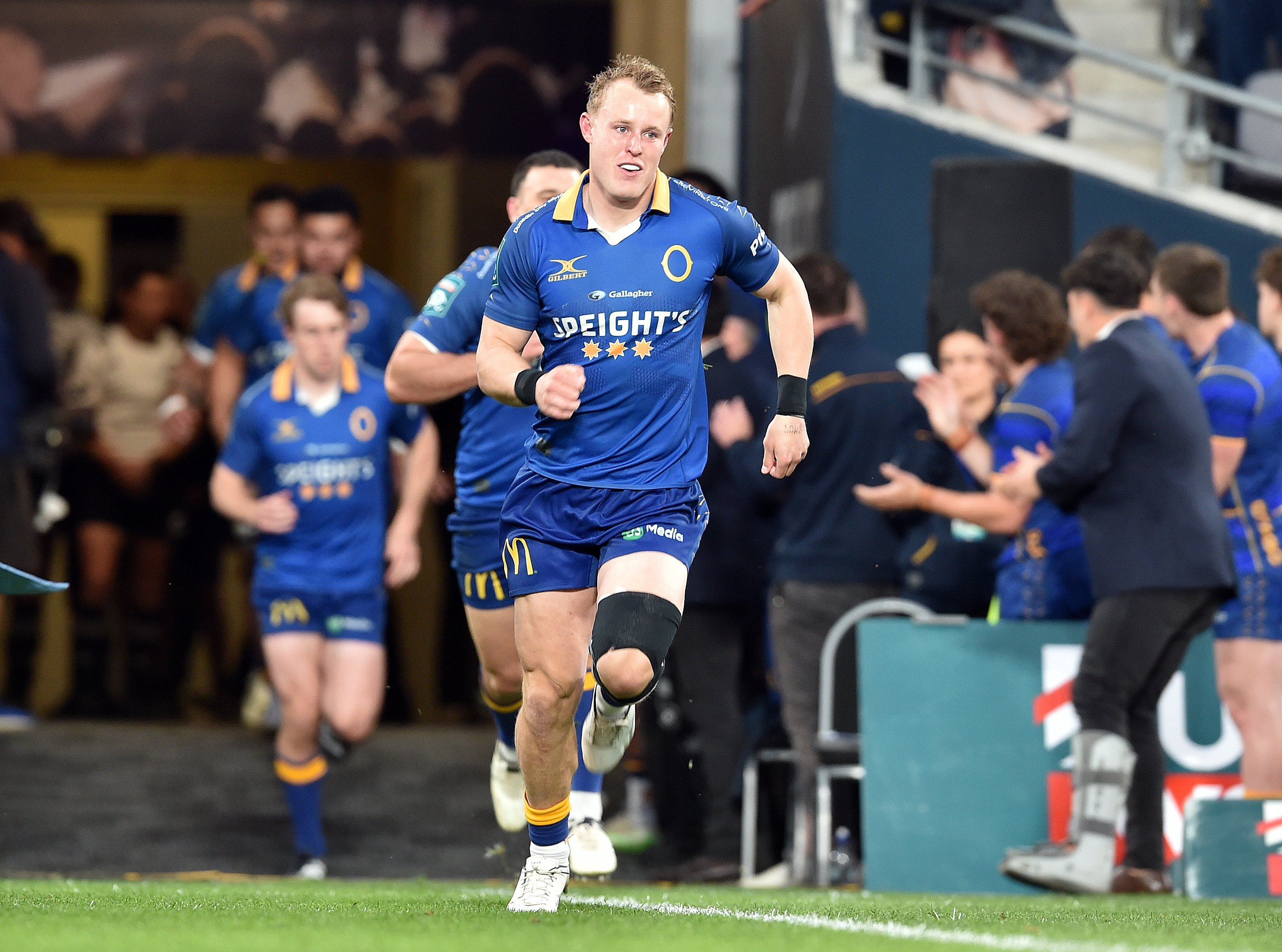 Otago captain Sam Gilbert leads his team out for the NPC semifinal against Bay of Plenty at...