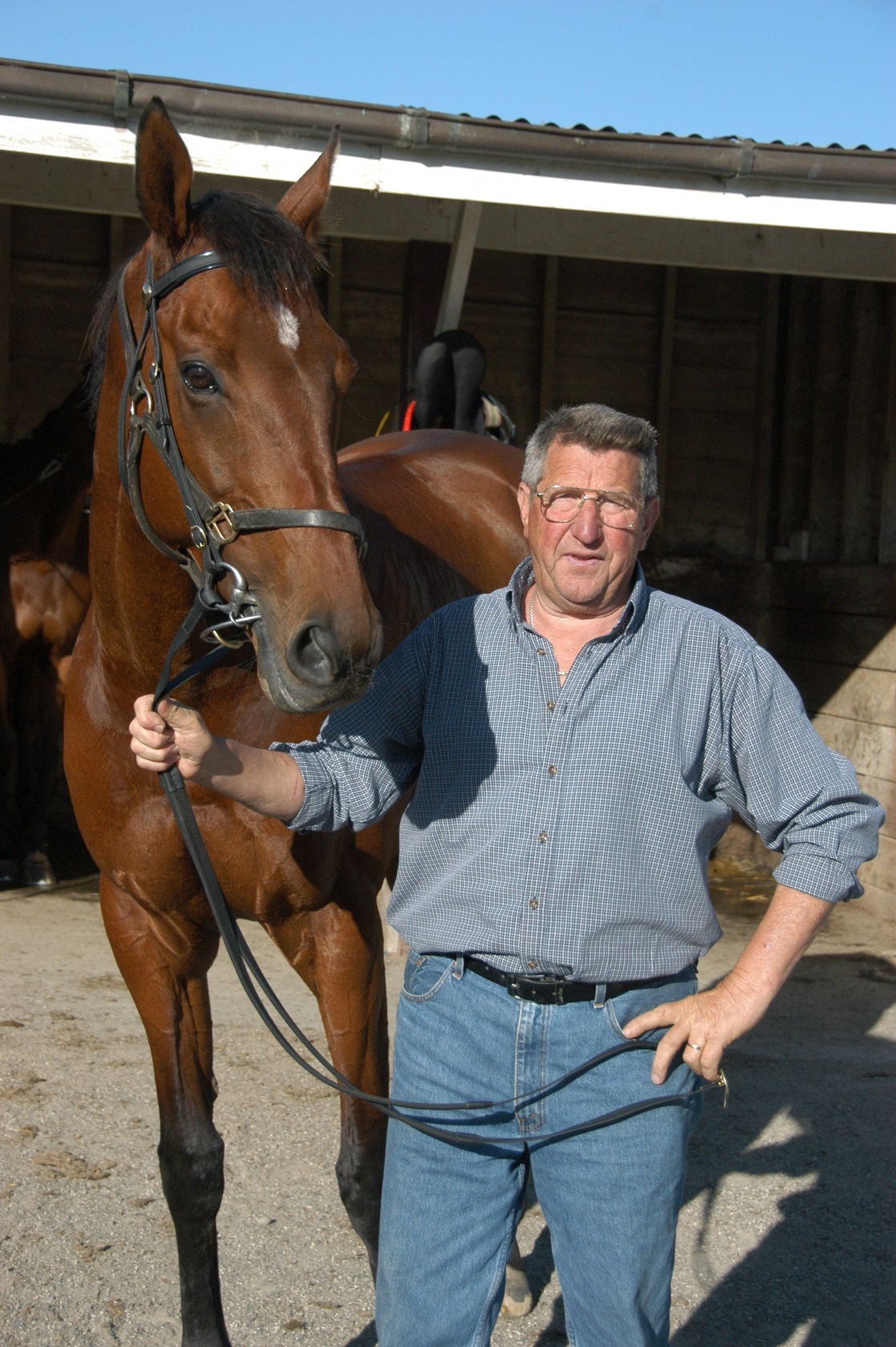 Ten-race winner Sand Sweeper and proud trainer Hec Anderton. Photo: ODT files