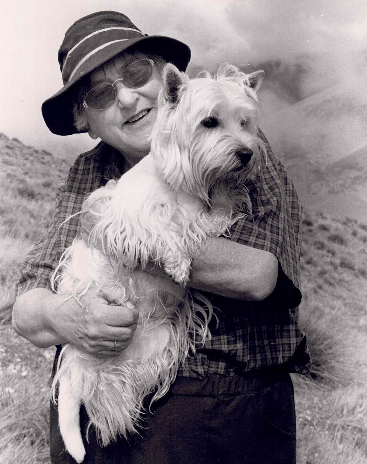 Dame Pat Harrison with one of her beloved dogs. Photo: supplied