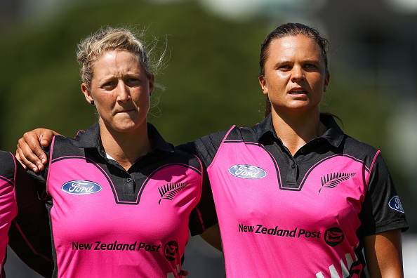 Sophie Devine (left) and Suzie Bates sing the national anthem before a White Ferns match in 2016....