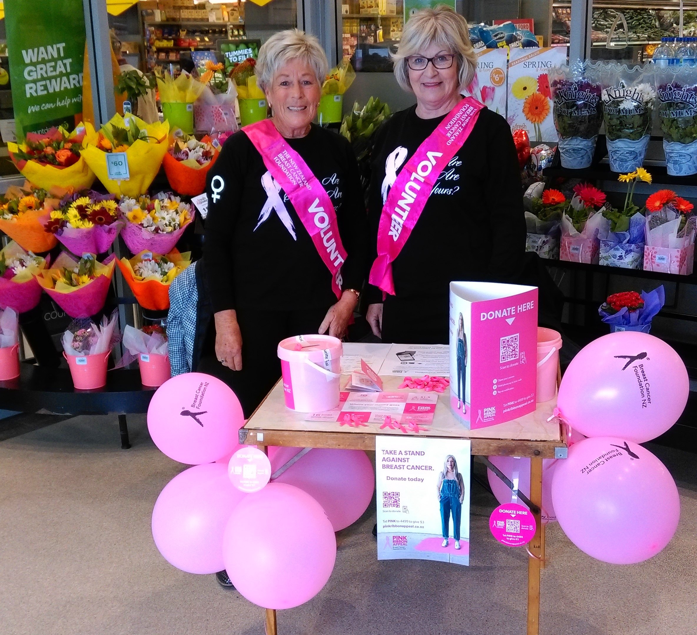 Neroli Mitchell (left) with her friend Marilyn Edwards volunteer at a previous Pink Ribbon Street...