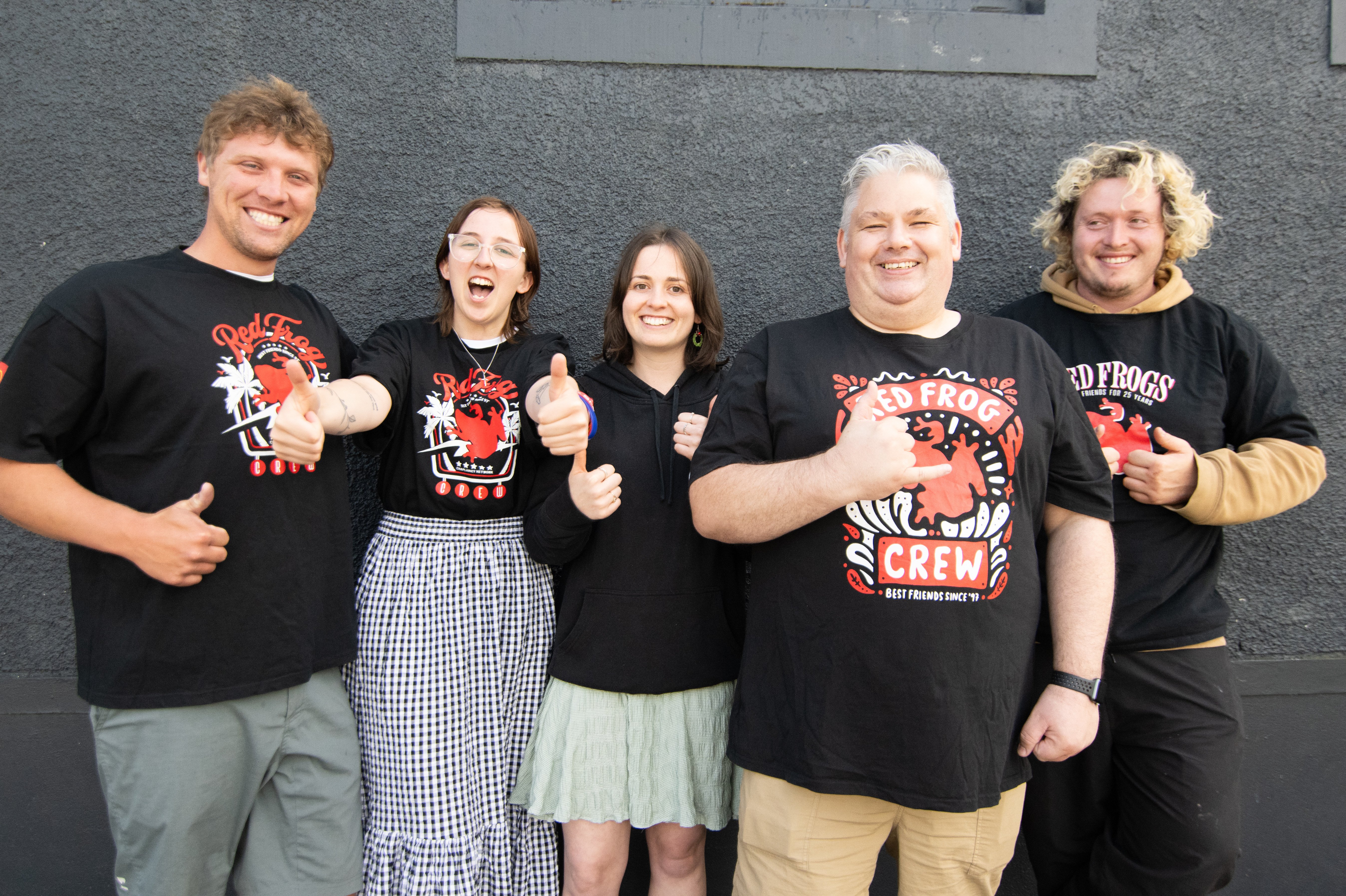 Heading to festivals last summer are Dunedin Red Frog volunteers and members (from left) Lewis...