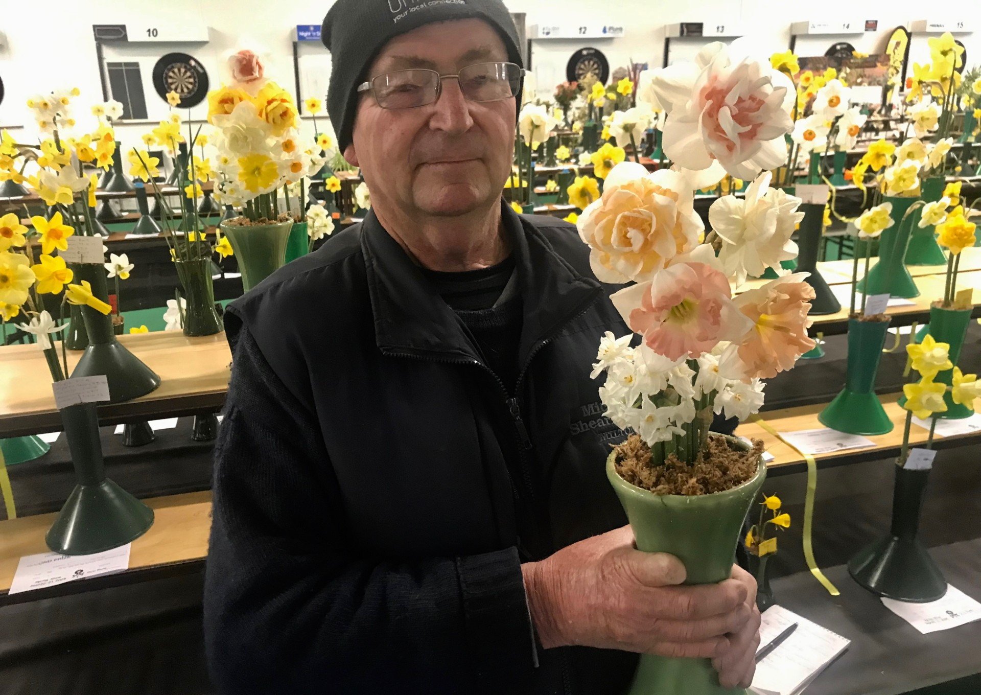 Alan Brown, of Milburn, with one of the vases of daffodils the judge called a ‘‘superb entry’’ at...