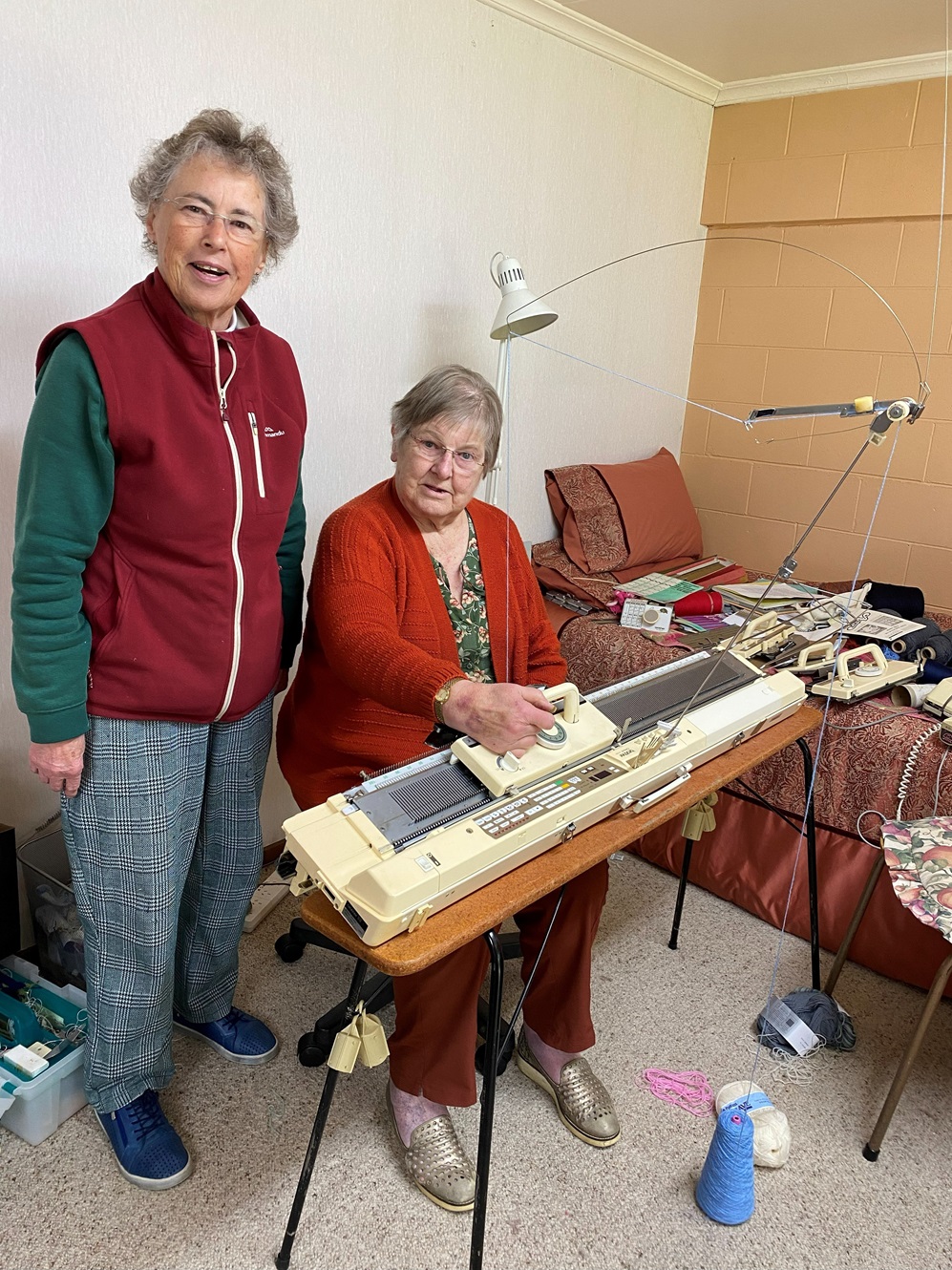 New Zealand Machine Knitters Society Otago branch member Marie Dickson (left) and president...
