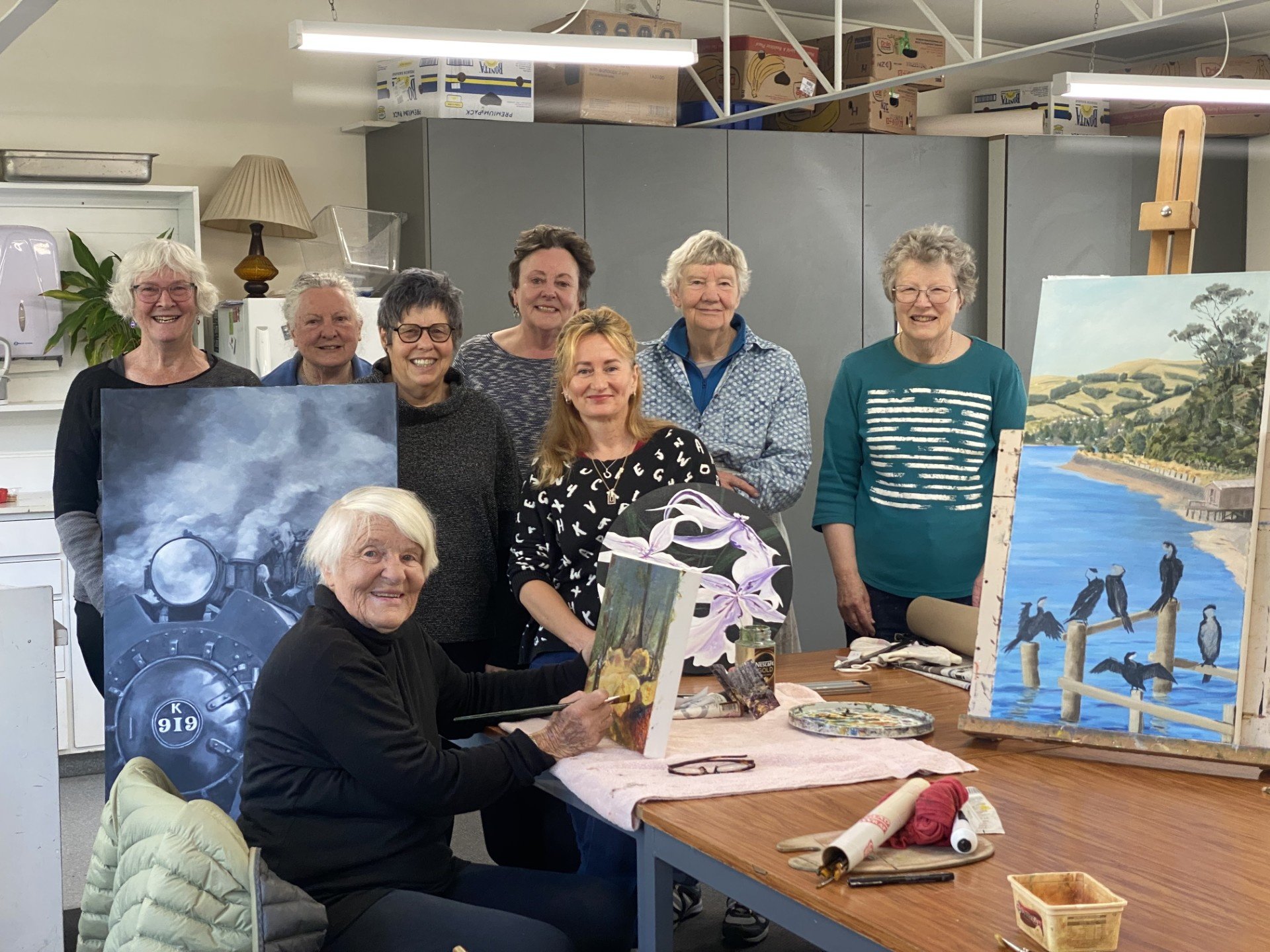 A group of local painters gathering with some of their works ahead of their "Art in November"...