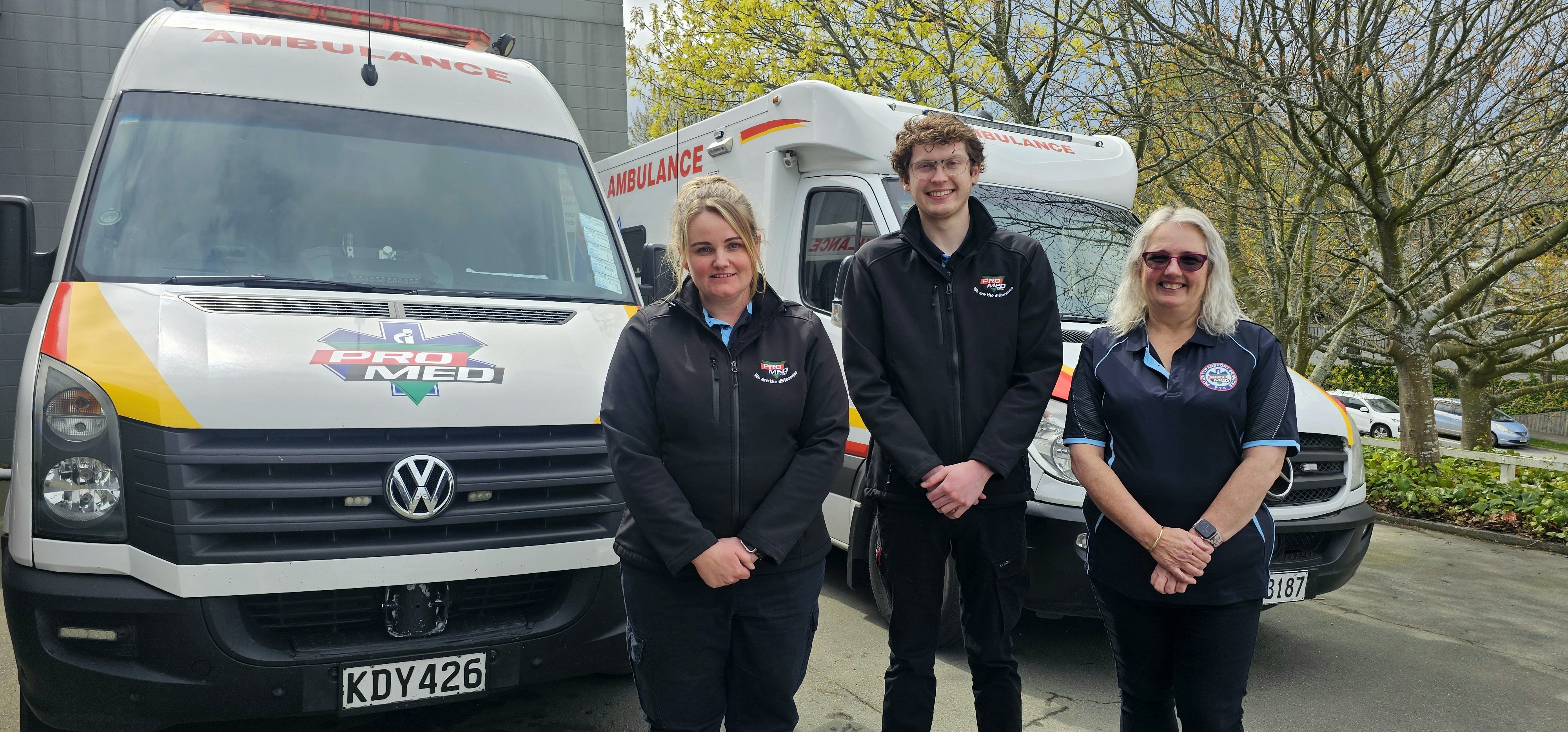 Showing off the pair of Pro+Med ambulances are (from left) patient transfer service (PTS) co...