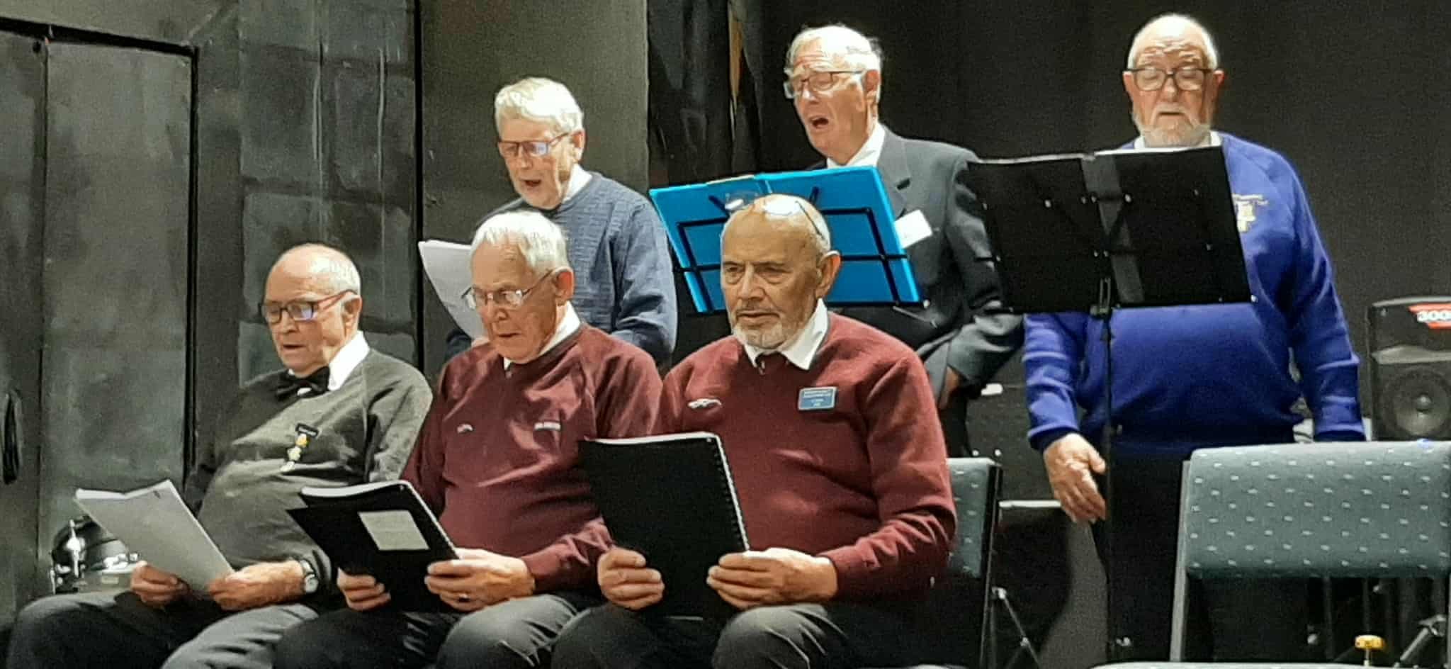 In full voice were the men’s group of (top, from left) Murray Gibson, Ray Walker, and Gaven Cain...