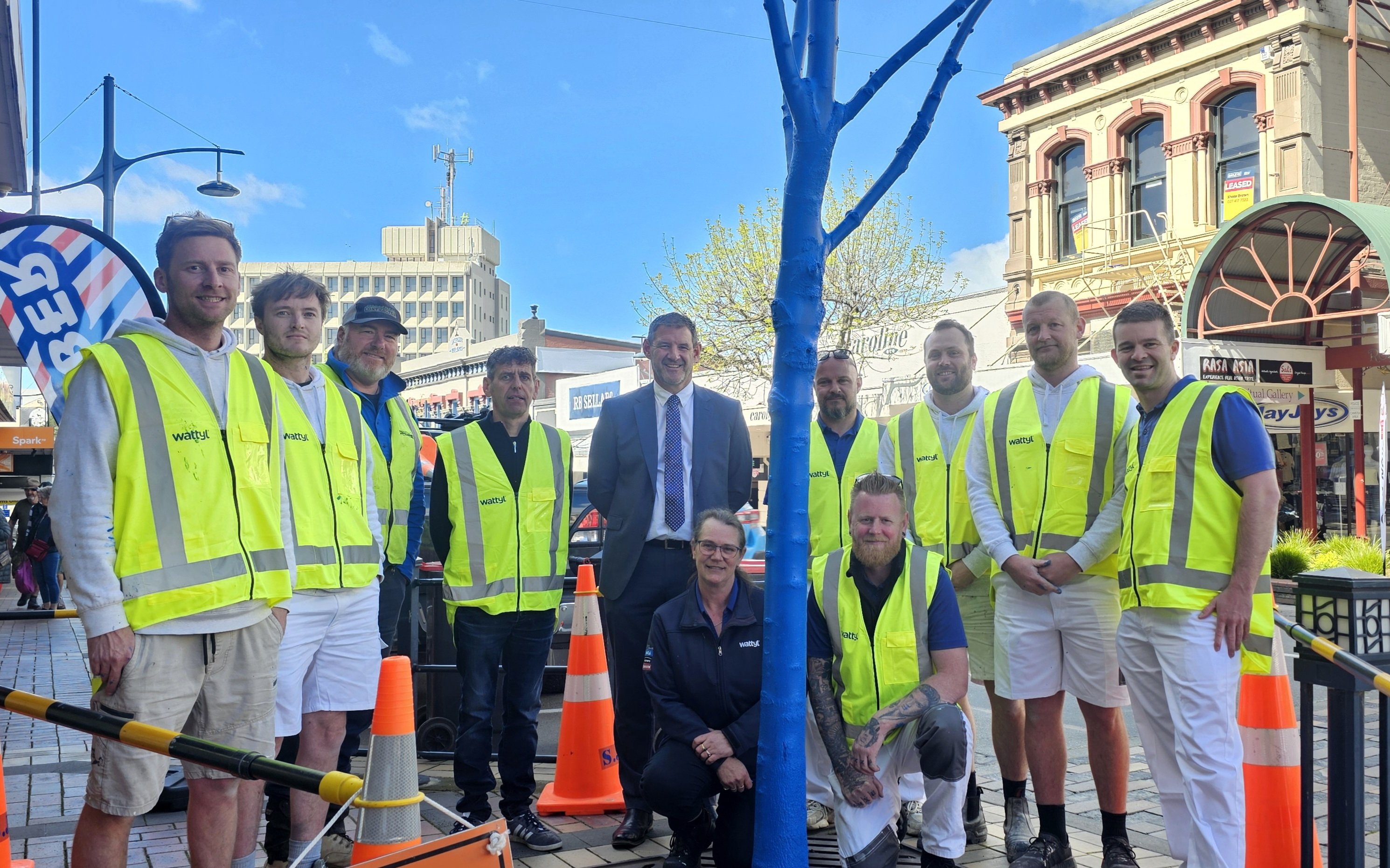 Timaru District Mayor Nigel Bowen (centre) and team members and painters from Wattyl New Zealand...