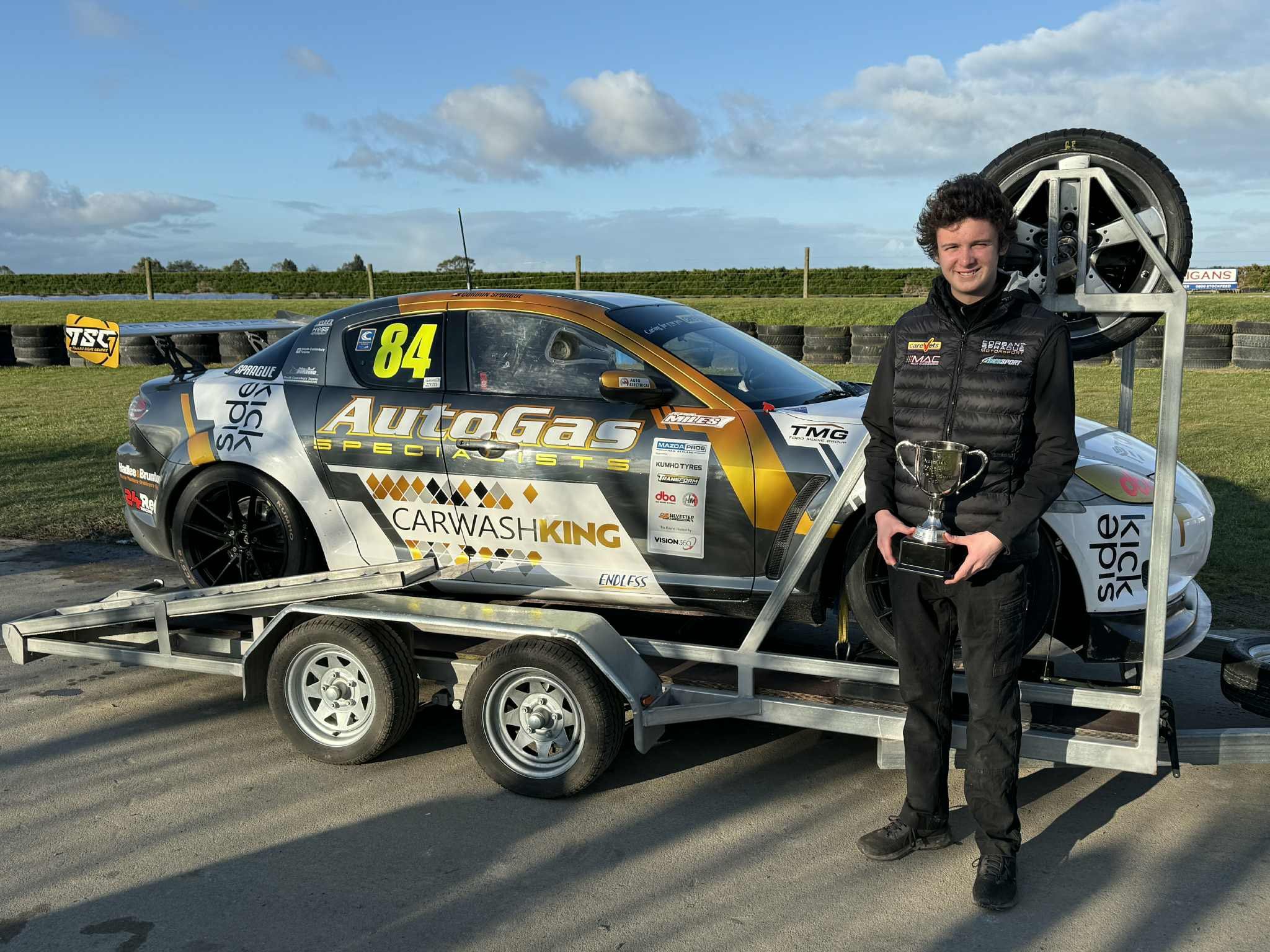 Corban Sprague shows off his Mazda Pro8 New Zealand Championship Enduro Cup trophy, which he won...