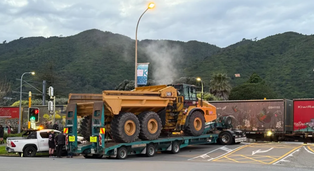 The truck was towing a digger when the crash occurred. Photo: Supplied / Stuart Bollam