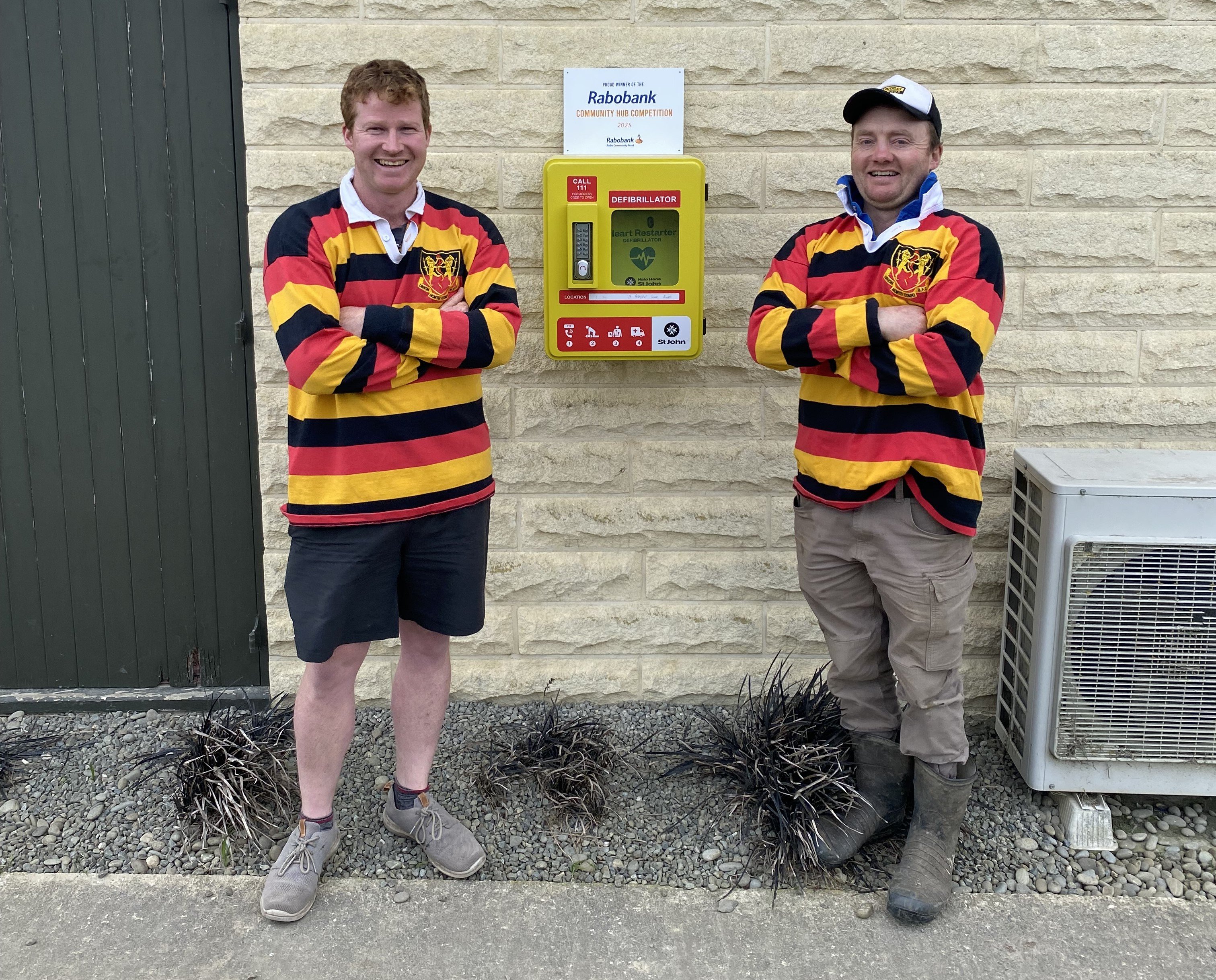 James Hutton and Phil Wilson from Union Rugby Club in Ngapara with their new AED. PHOTO: Supplied...
