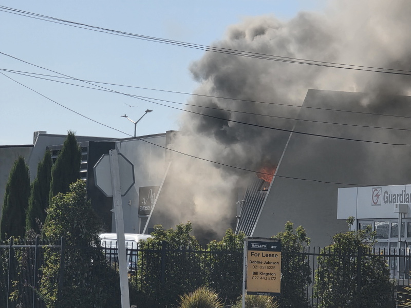 Firefighters battle the blaze in Colridge St today. Photo: Daniel Alvey