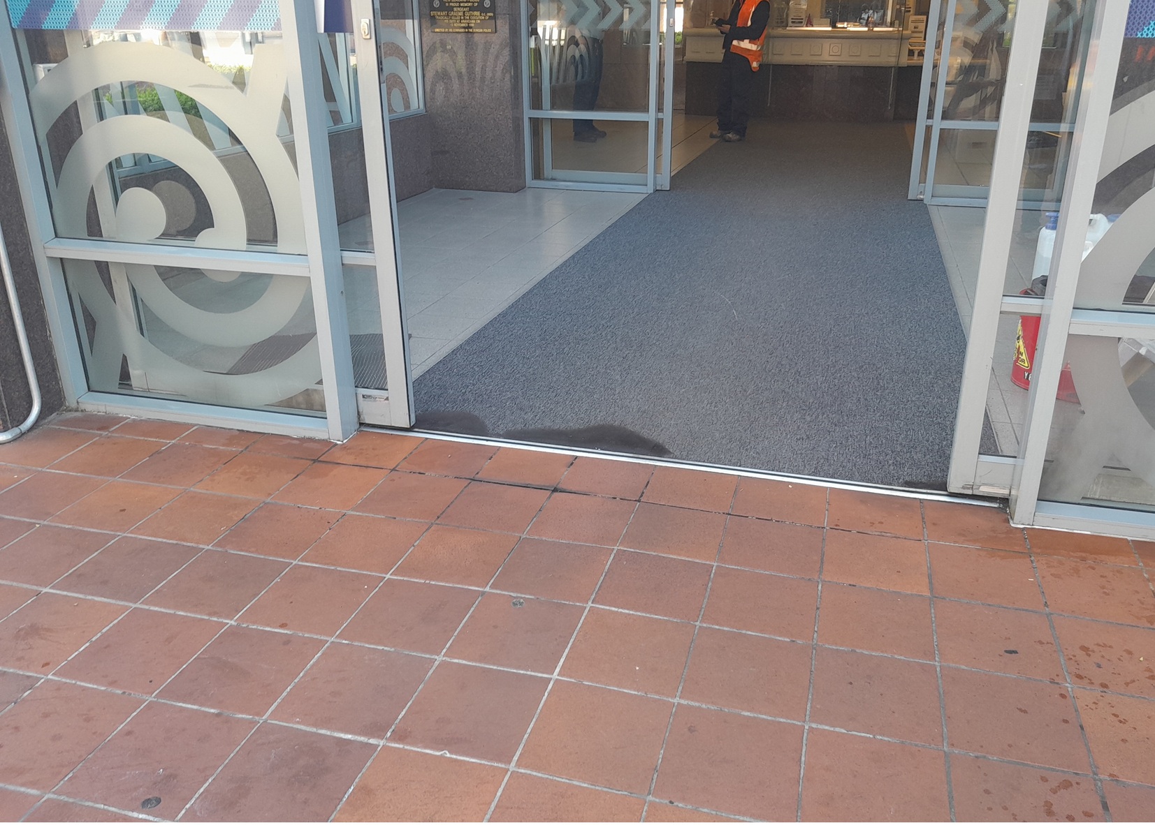 Singed carpet and tiles at the Dunedin Central Police station this morning after a man allegedly...
