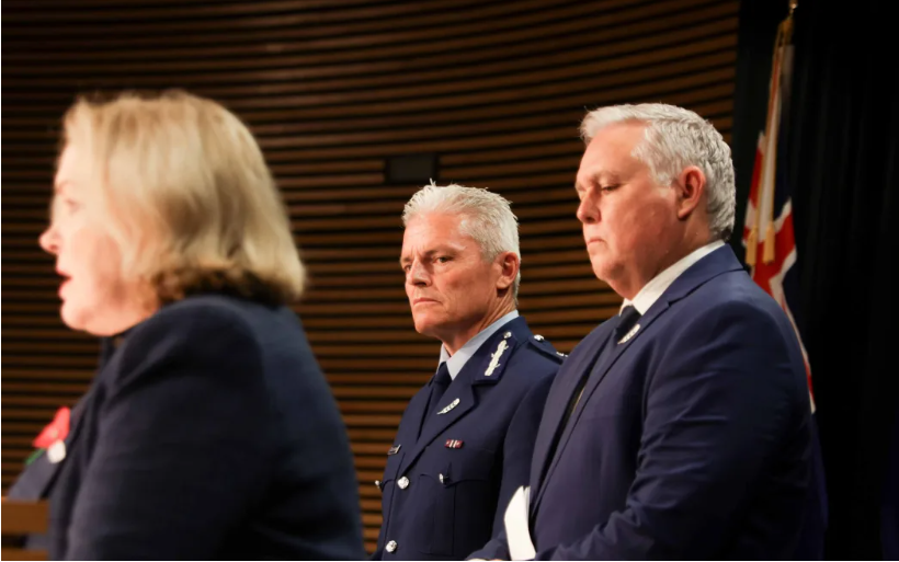 Public Services Minister Judith Collins (L) speaks after the damning IPCA report into police...