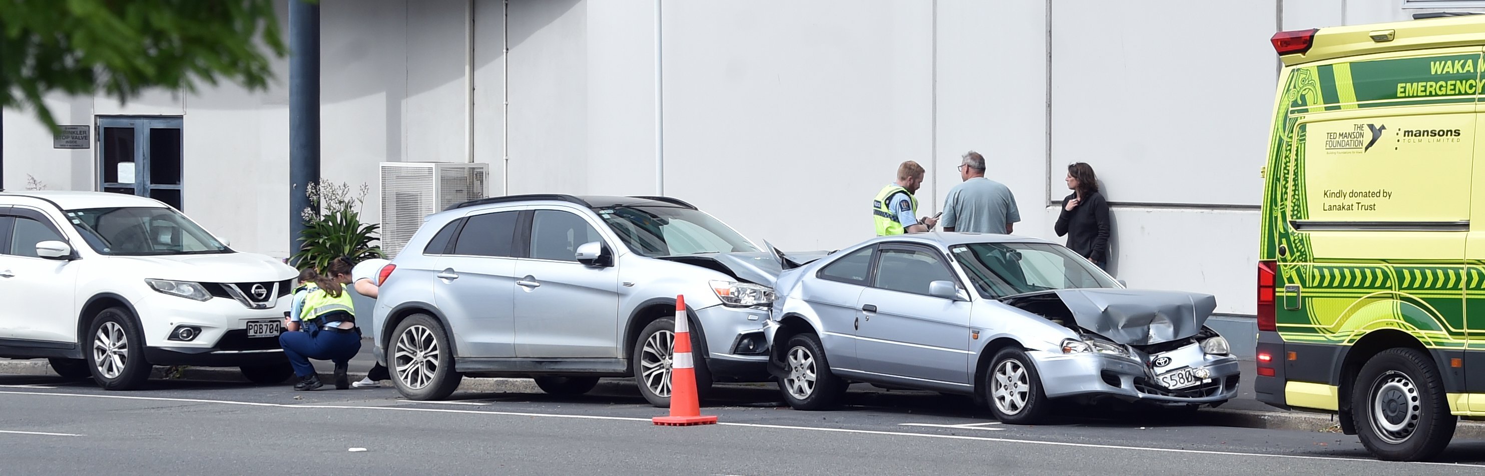 Emergency services work at the scene of a crash in Malcolm St. Photo: Peter McIntosh