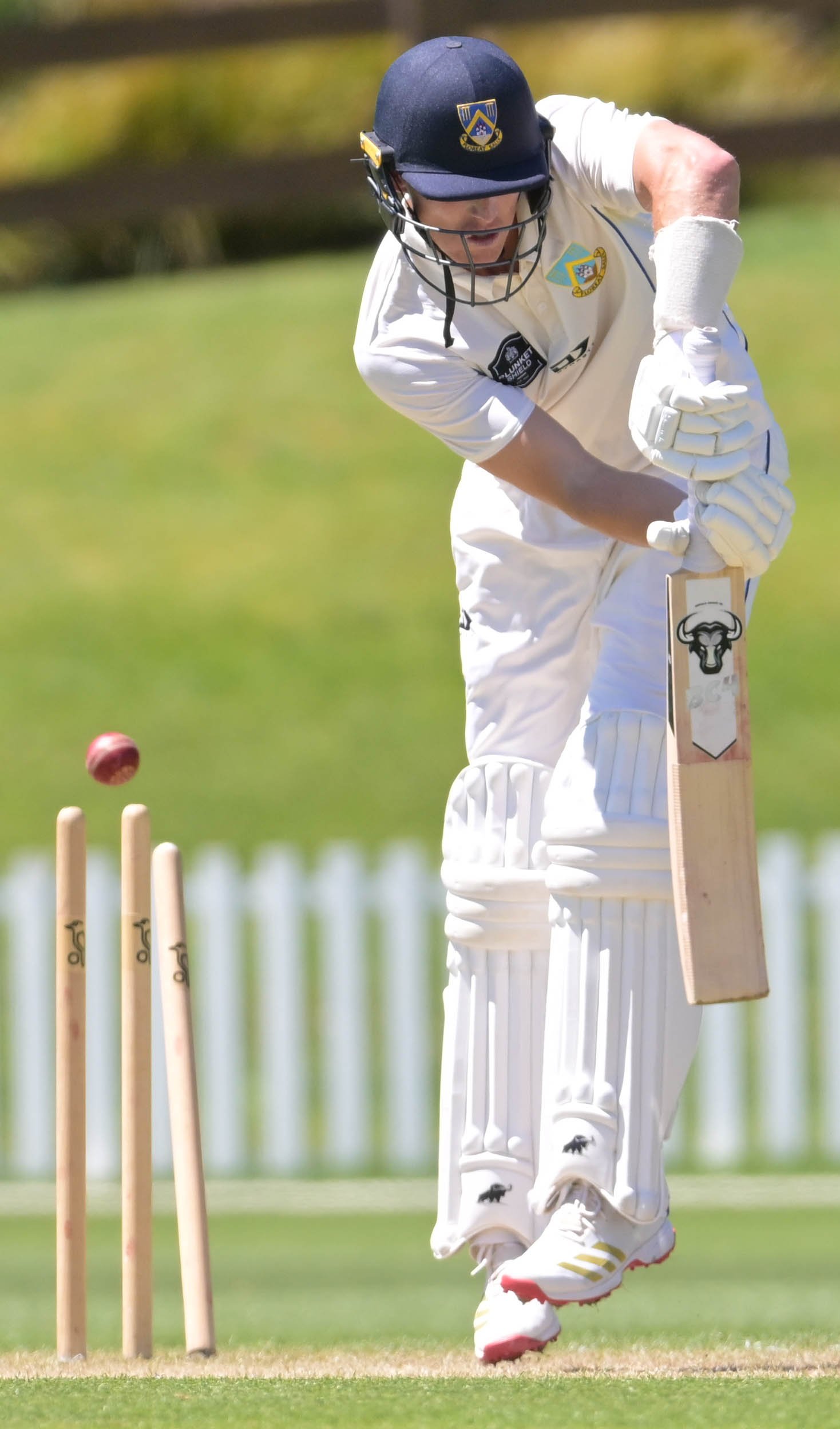 Otago opening batter Jack Boyle is bowled by Canterbury paceman Michael Rae during the second day...