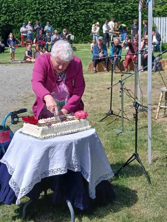 The cake was cut by former resident Betty Greenslade. PHOTO: JAMES BEATTY