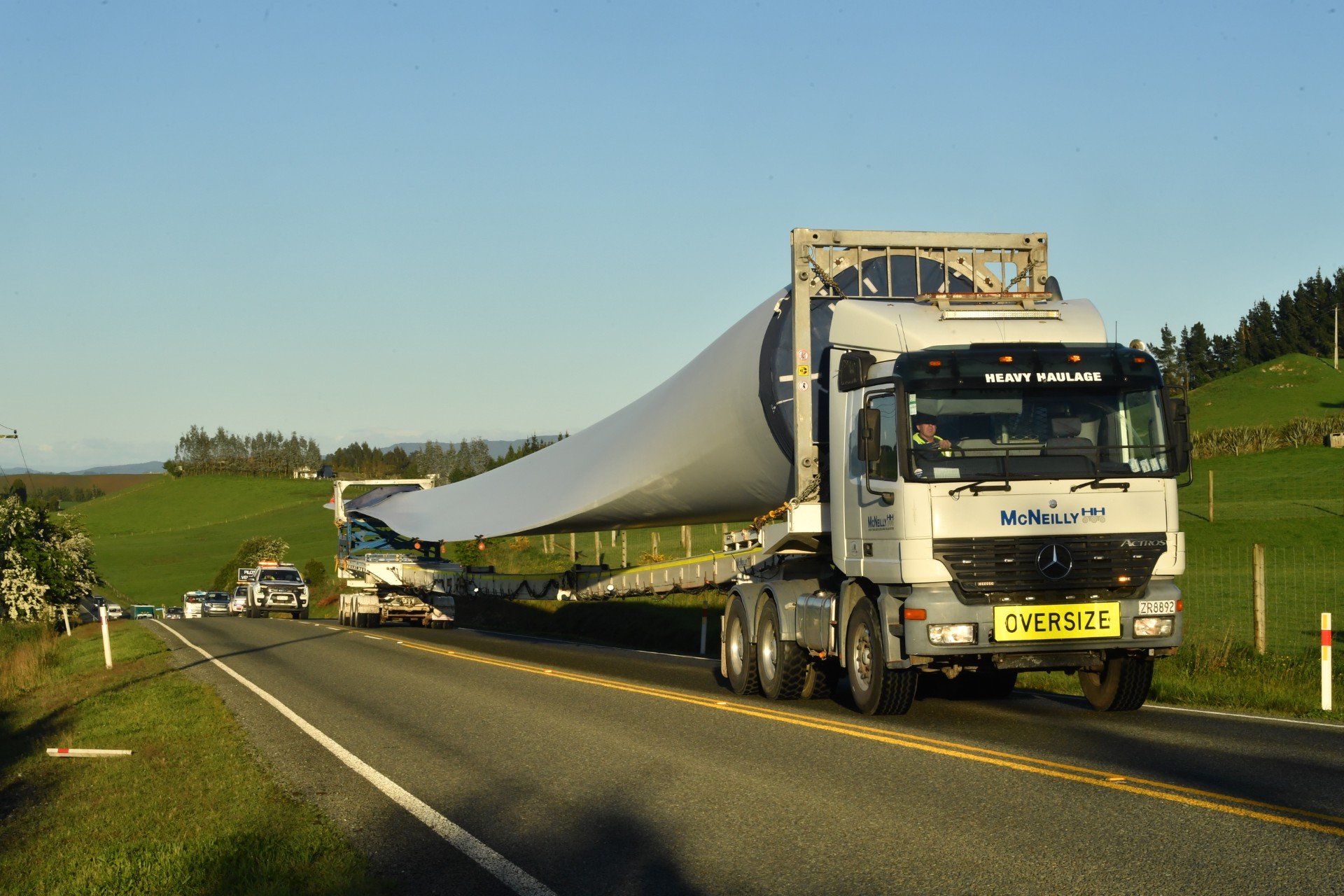 Blades and towers for Mercury Energy’s Kaiwera wind farm are seen being transported on SH92...