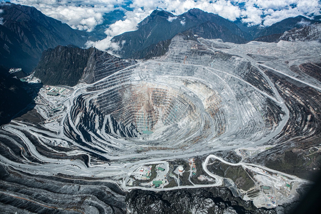 Indonesia’s Freeport Grasberg gold and copper mine in West Papua. The mine stacks waste rock...