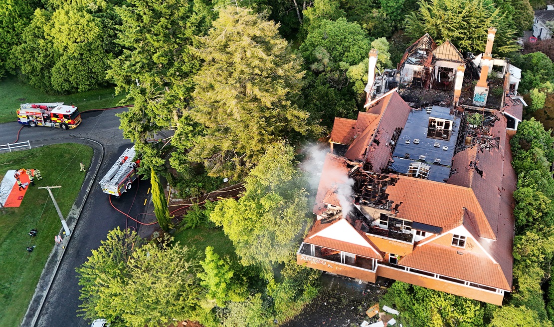 A pillar of smoke rises from the abandoned former Glamis Hospital following an early morning fire...