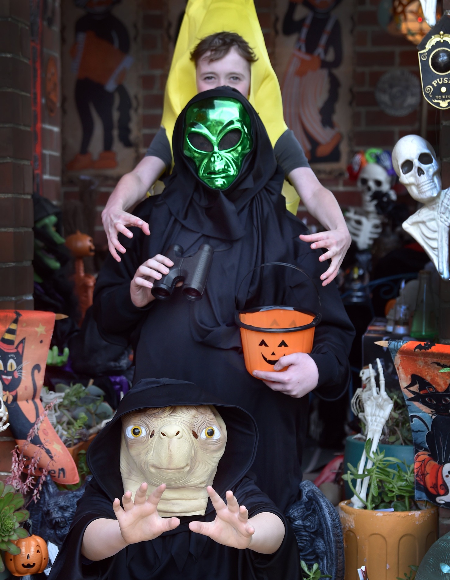 Visiting the haunted house on the corner of Moreau and Council Sts in South Dunedin are (from top...