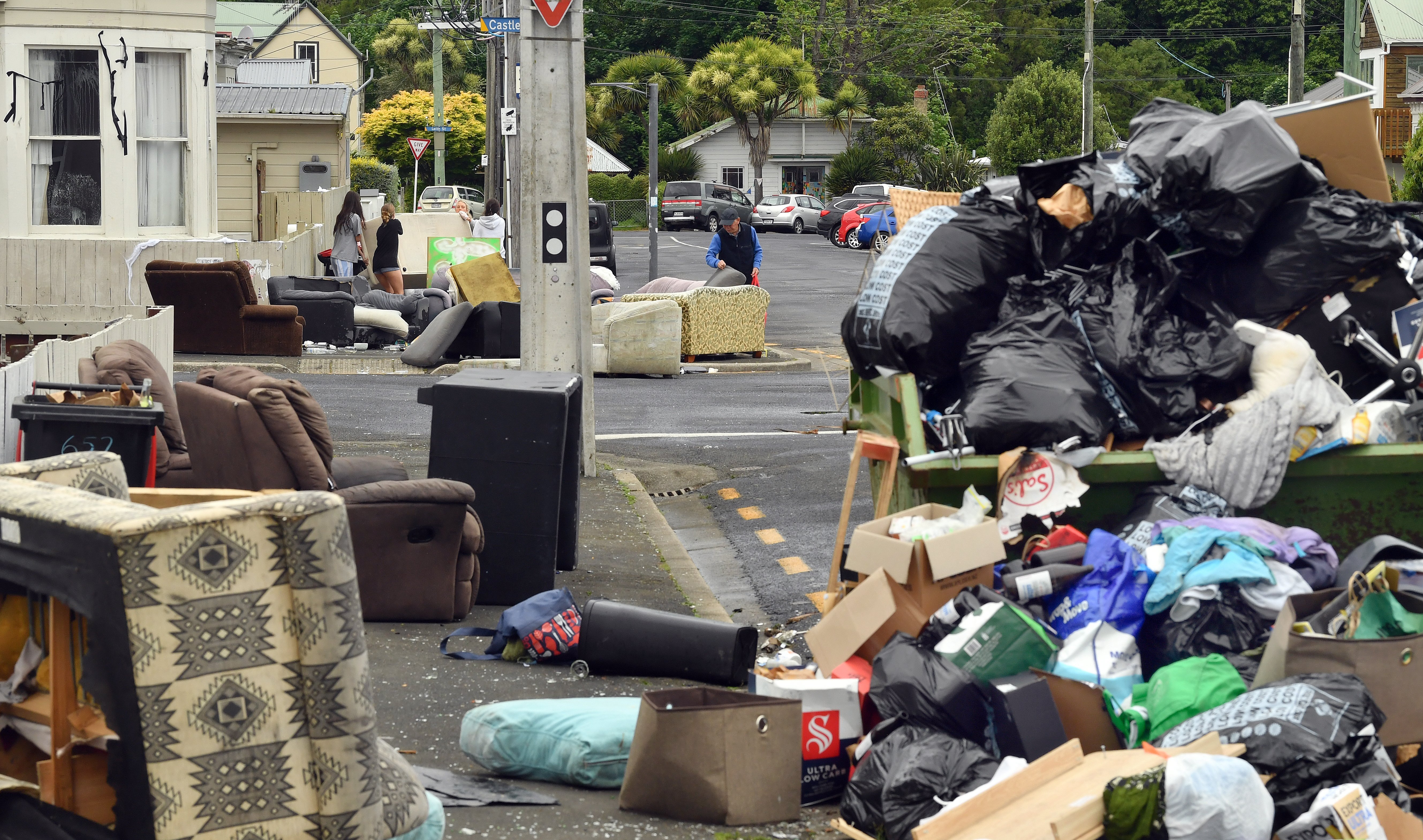 An overflowing skip and dozens of dumped couches litter the student quarter yesterday. PHOTOS:...