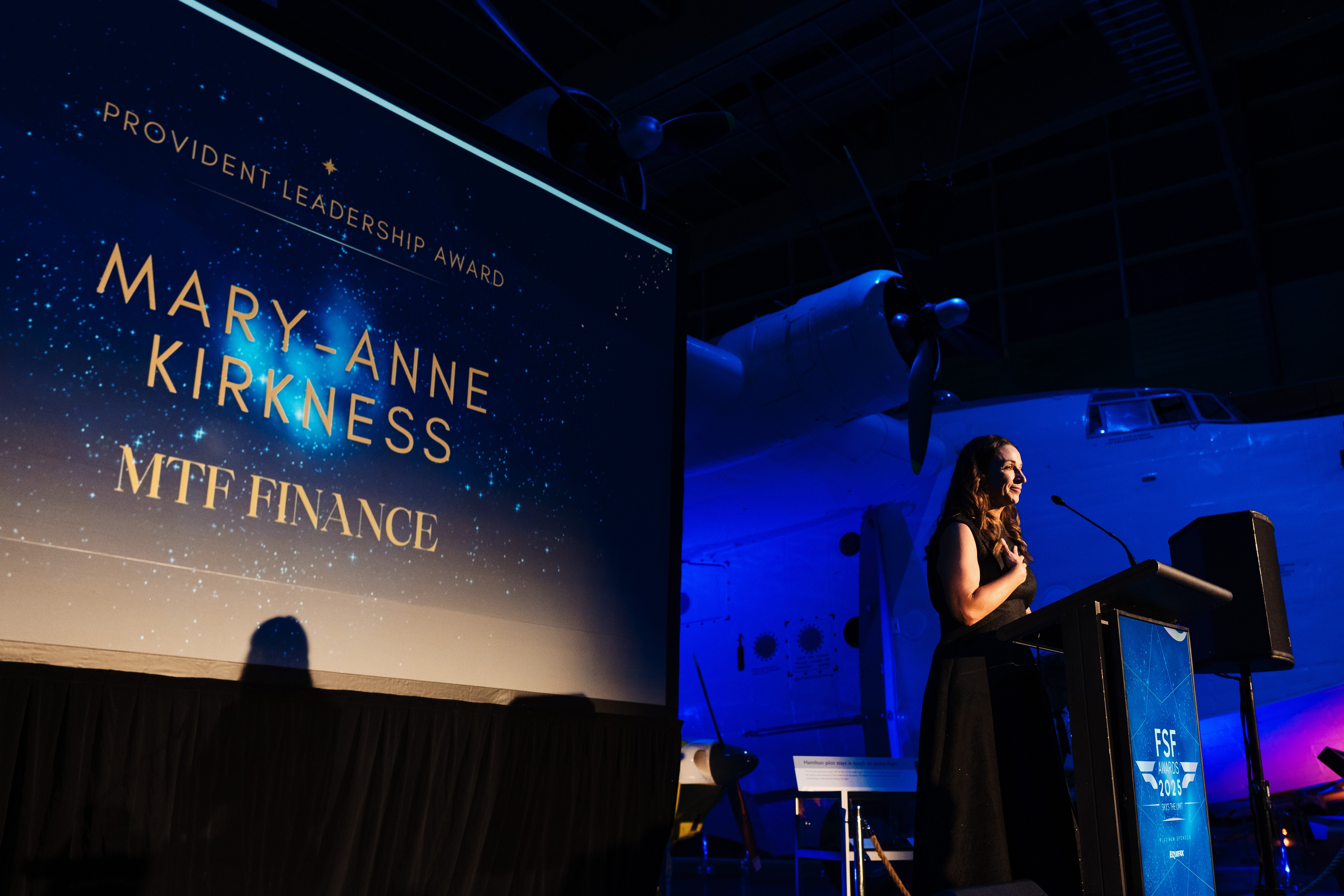 Mary-Anne Kirkness accepts the Provident Insurance leadership award at the Financial Services...