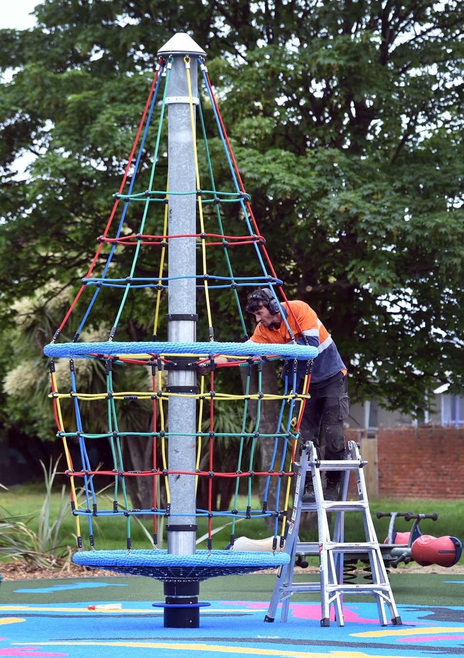 An SGC Projects contractor works on the new net spinner at Navy Park in South Dunedin yesterday....