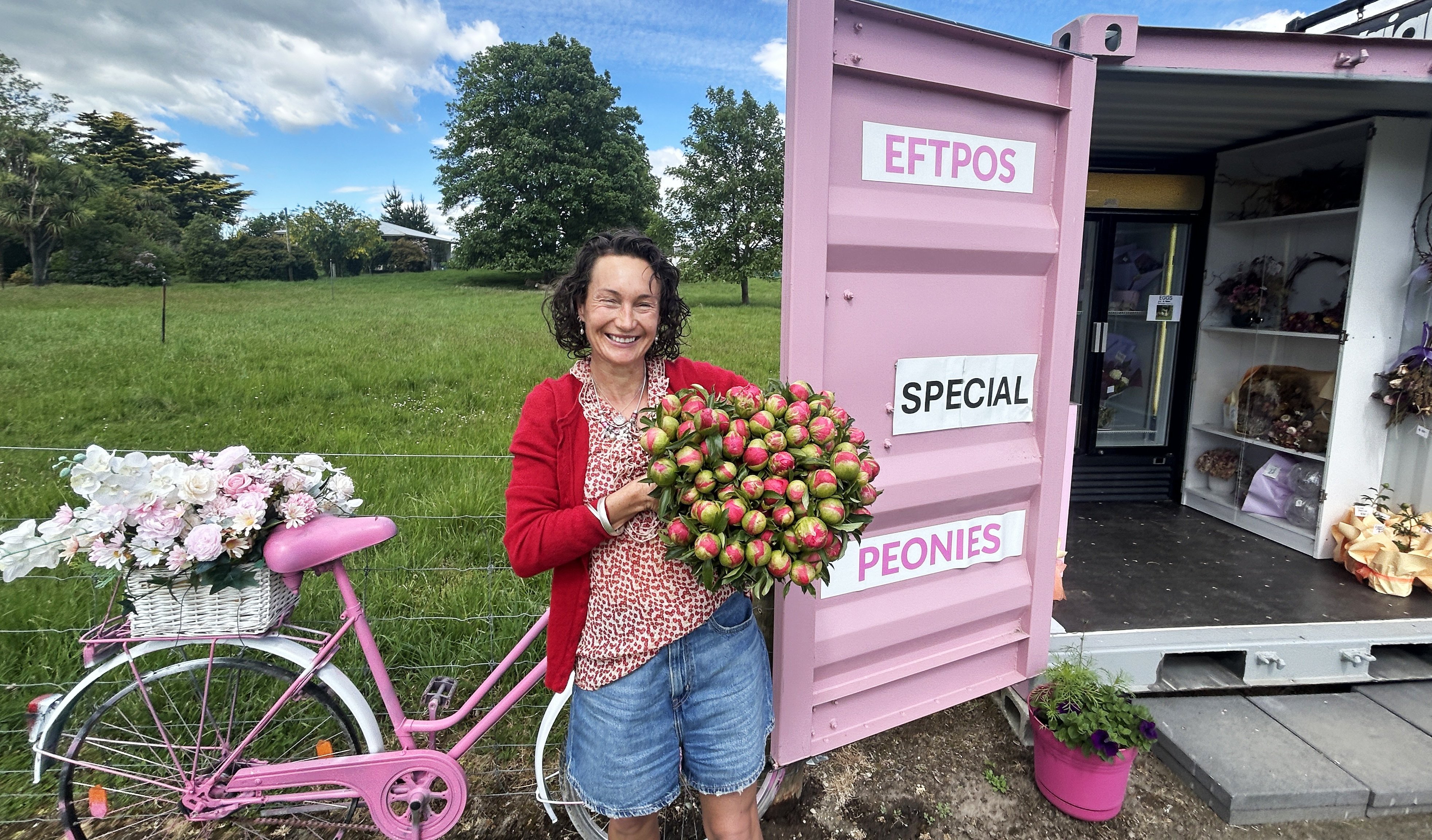 Blooming Marvellous owner and florist Sarah McDougall holds a bunch of peonies fresh from her...